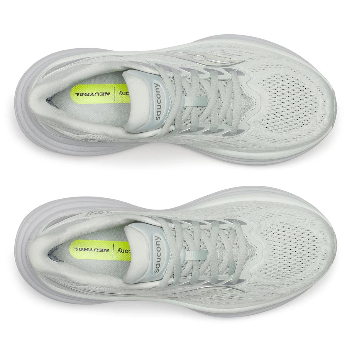 Top view of a pair of Women’s Triumph 24 Running Shoes Cast with white mesh uppers, white laces, and yellow insoles labeled NEUTRAL. Featuring premium incrediLUX foam cushioning, the shoes are placed parallel on a white background.