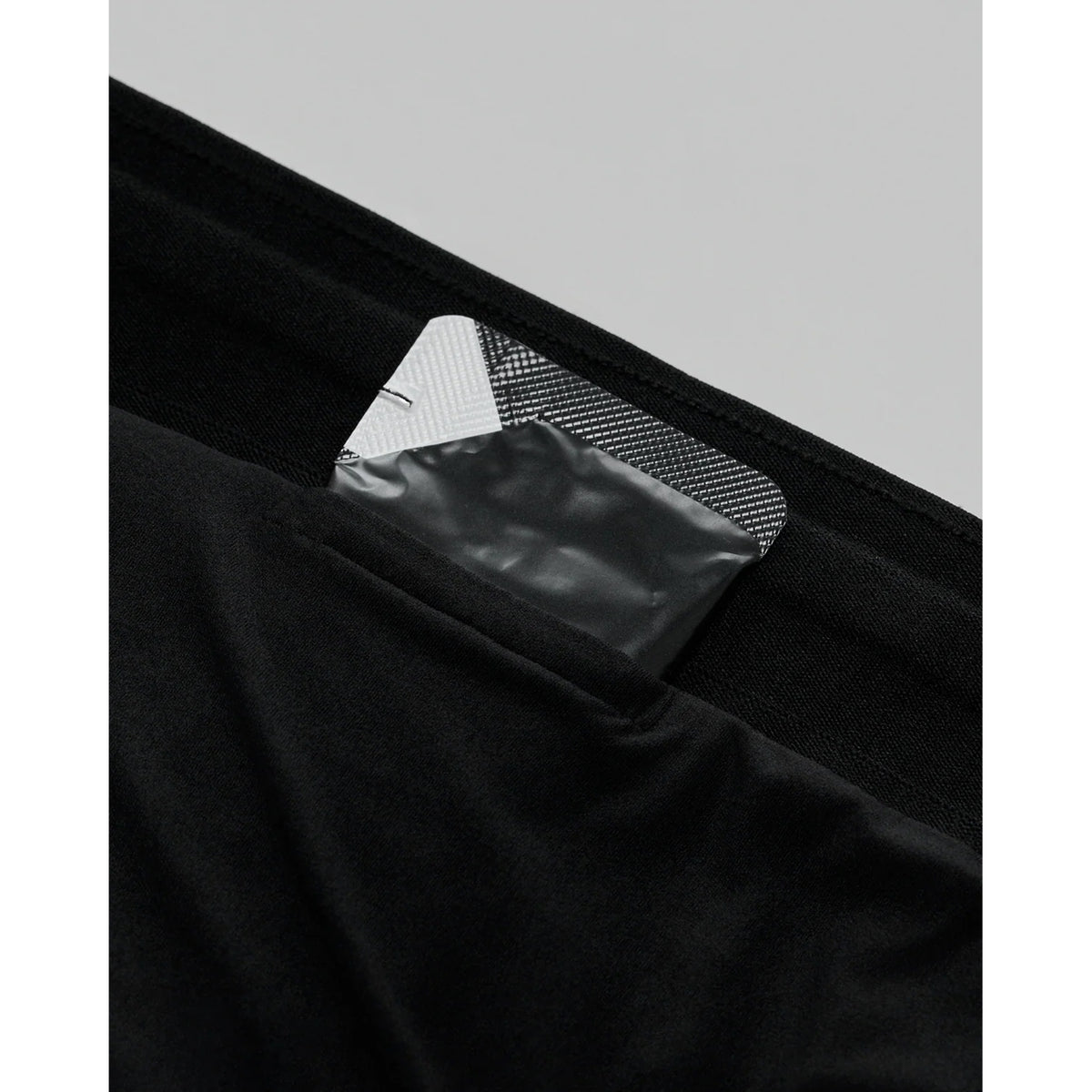 Bandit Vento™ Next Gen 3 Inch Split Shorts women's in Black — closeup showing four dedicated gel pockets within the bonded seamless waistband construction