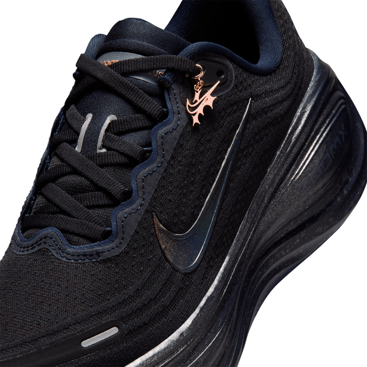 Women's Nike Vomero Plus Keely Hodgkinson Running Shoes Pitch Blue Blur Blackened Blue Black showing detachable gold charm for custom styling inspired by Keely Hodgkinson's medal-chasing drive