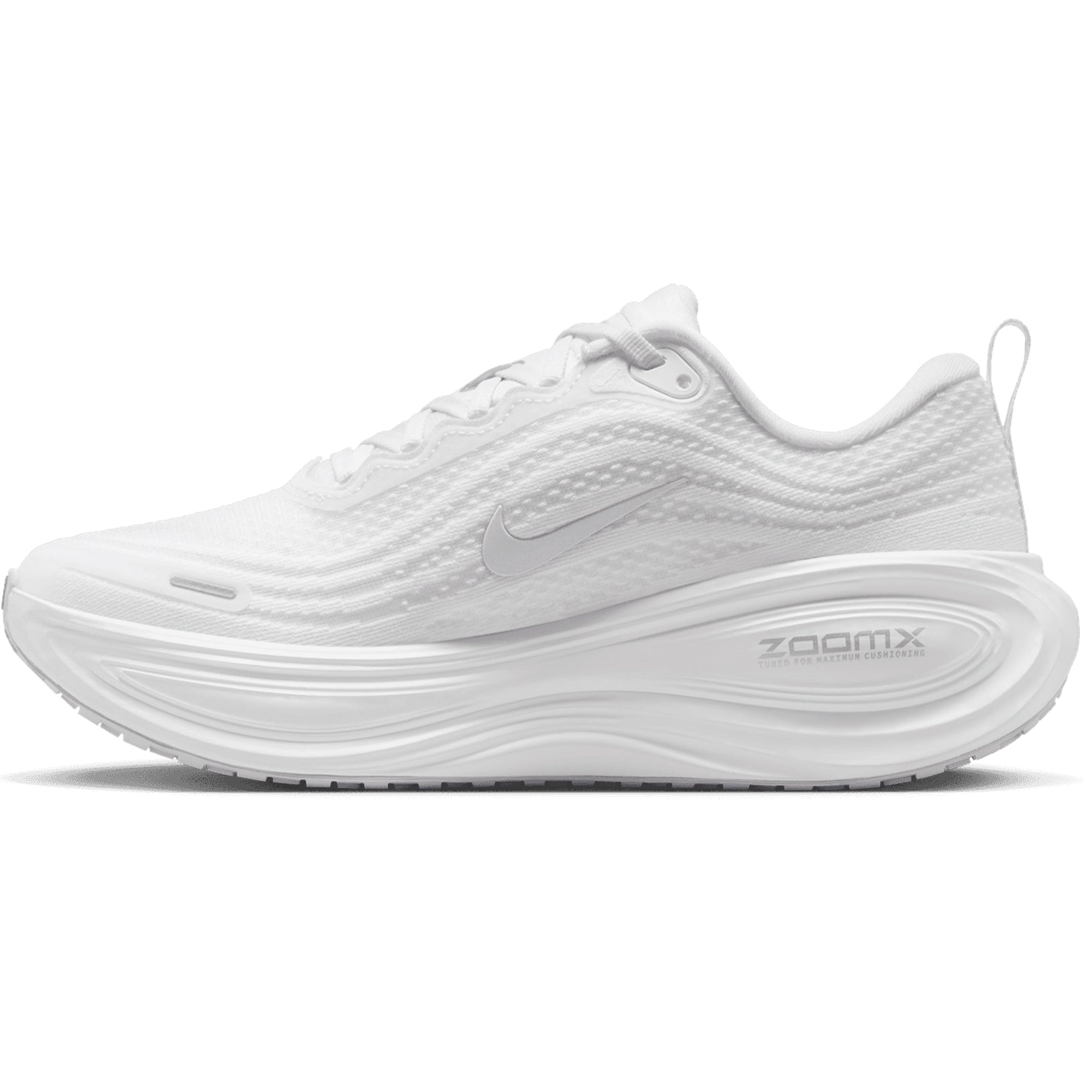 Nike Vomero Plus women's running shoe in White / Photon Dust / Metallic Silver / Summit White — inner view showing white engineered mesh upper, photon dust midsole detailing, responsive cushioning and foam construction with support structure