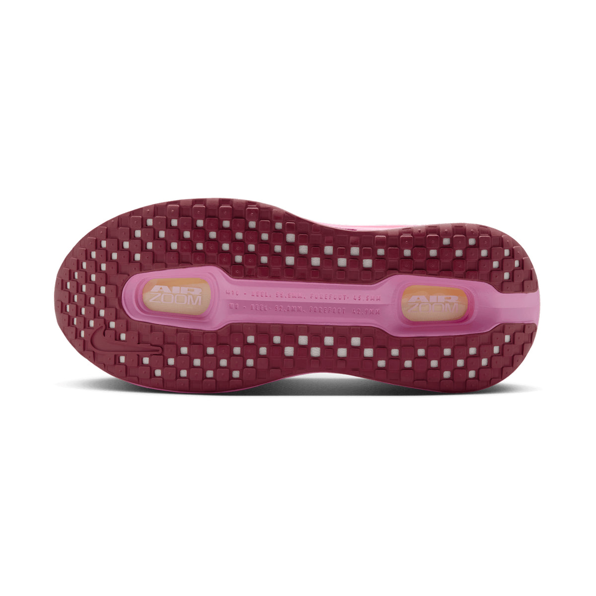 Nike Vomero Premium women's running shoe in Pink Foam / Pink Rise / Light Magenta / Pink Smoke — outsole view showing durable rubber tread pattern and pink rise responsive cushioning midsole stack profile