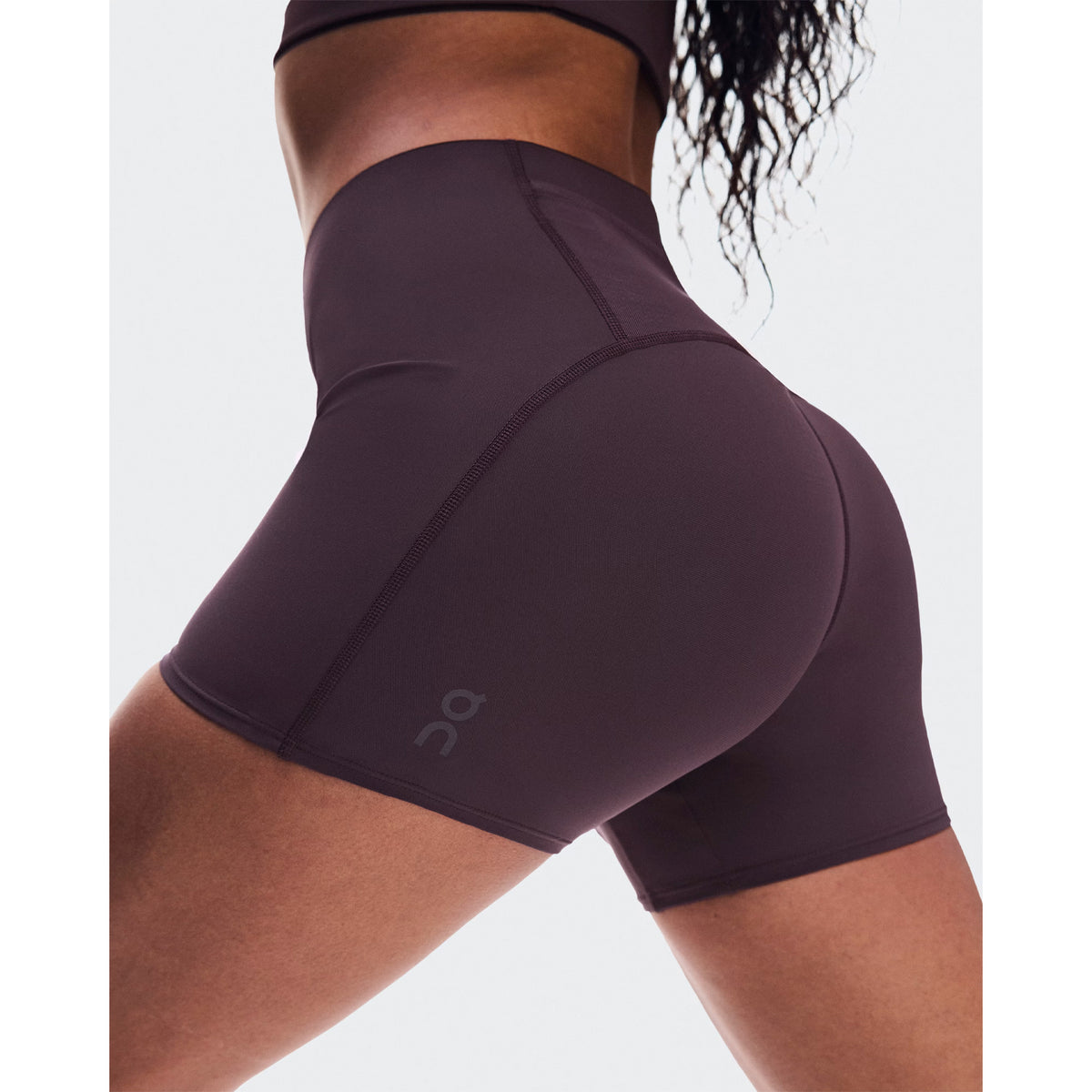 Women's On Zero Short Tights Urchin close-up of side showing lightweight technical moisture-wicking fabric with On athlete-inspired graphic detail and premium waistband construction for race day performance