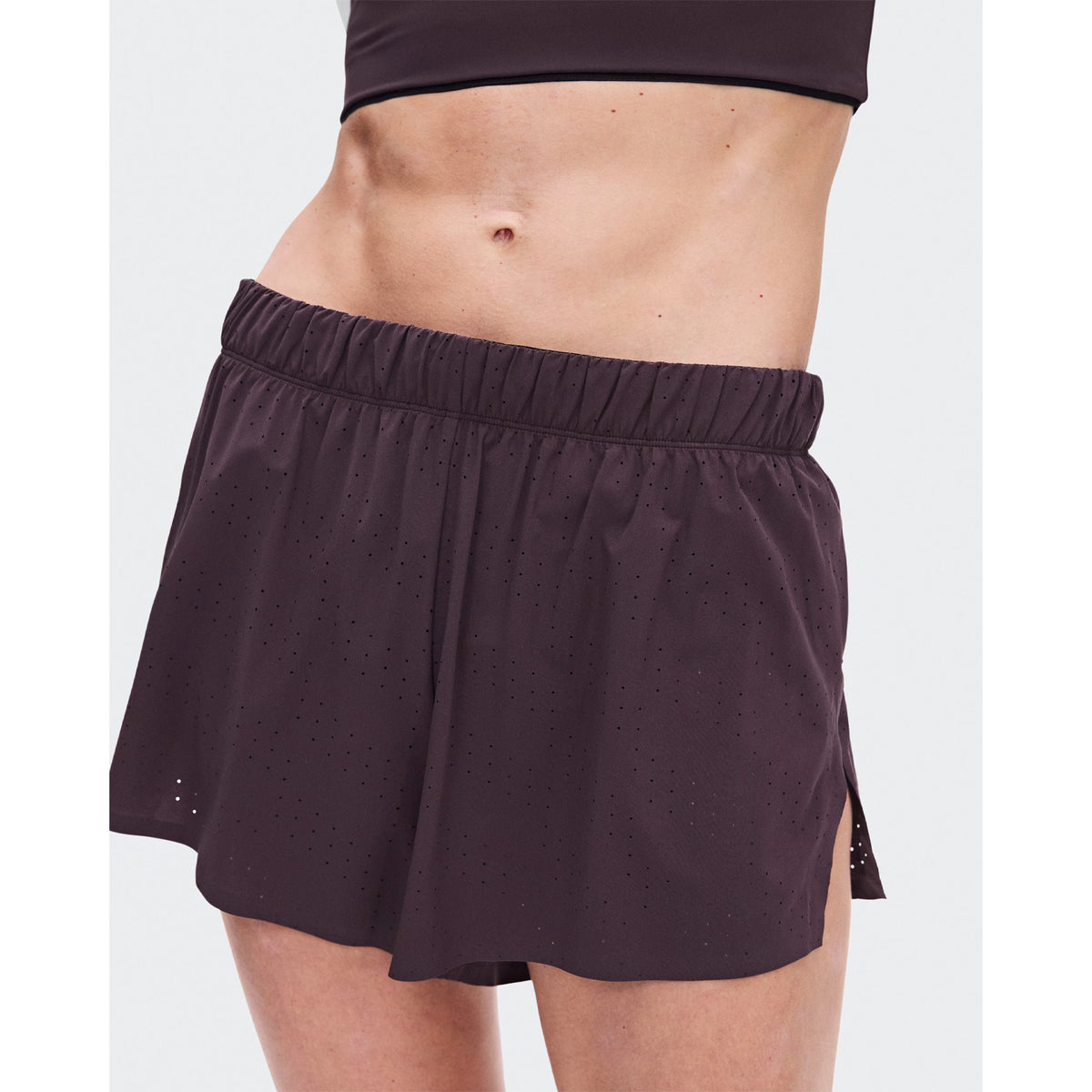 Women's On Zero Shorts Urchin close-up of stretch-woven perforated outer showing ventilation construction for improved airflow during race pace and sustained training efforts