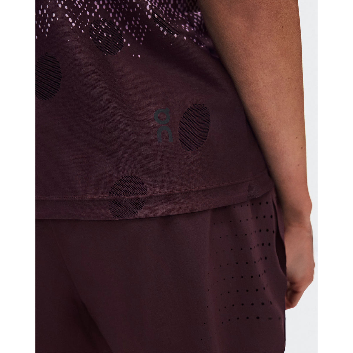 Women's On Zero Tank Breathe Foxglove White close-up of striking functional jacquard fabric showing On DryTec breathable moisture-wicking construction with minimal seams for ultralight distraction-free racing and training