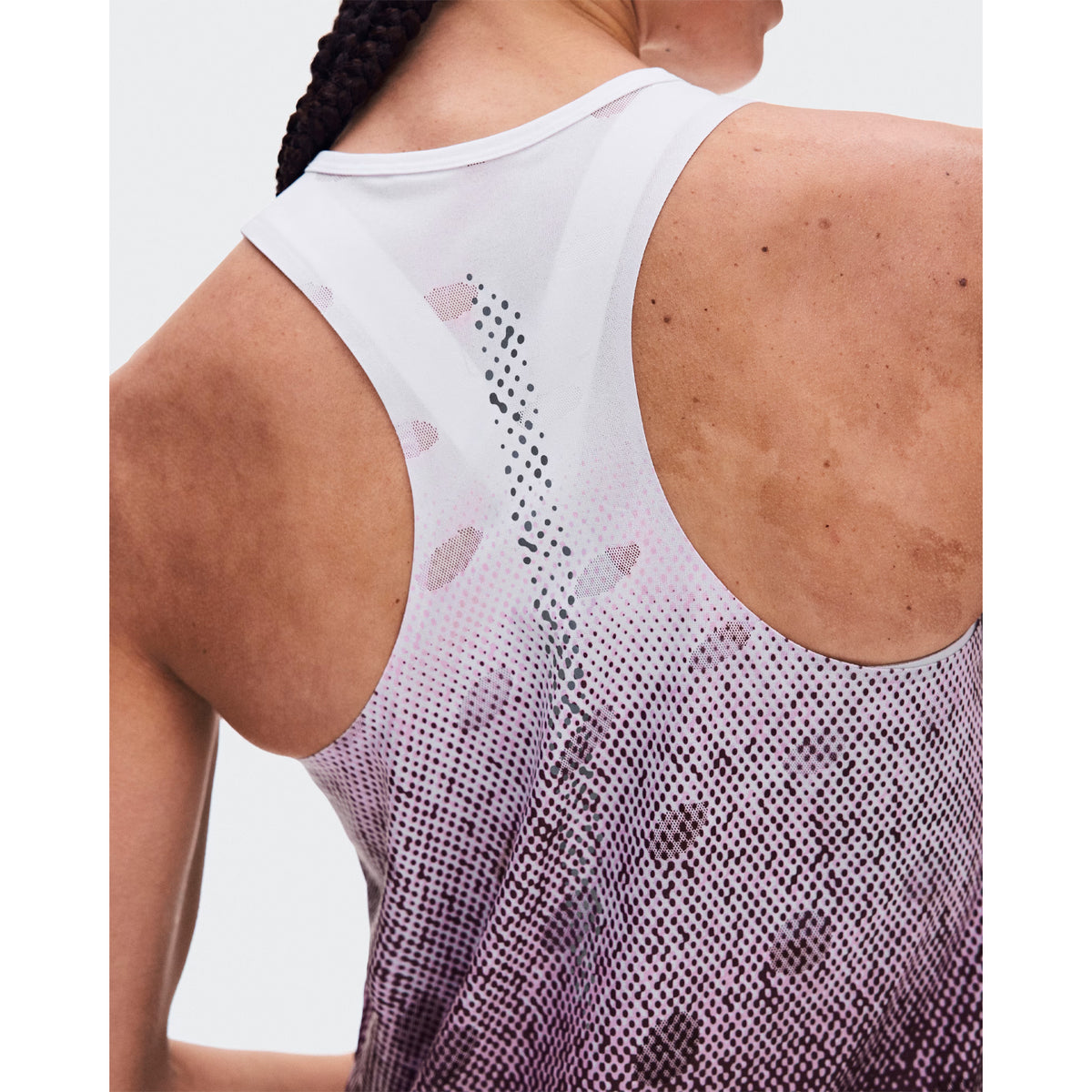 Women's On Zero Tank Breathe Foxglove White close-up of back showing athletic racerback construction with functional jacquard ventilation, signature reflective detailing and minimal seam design for distraction-free race day performance