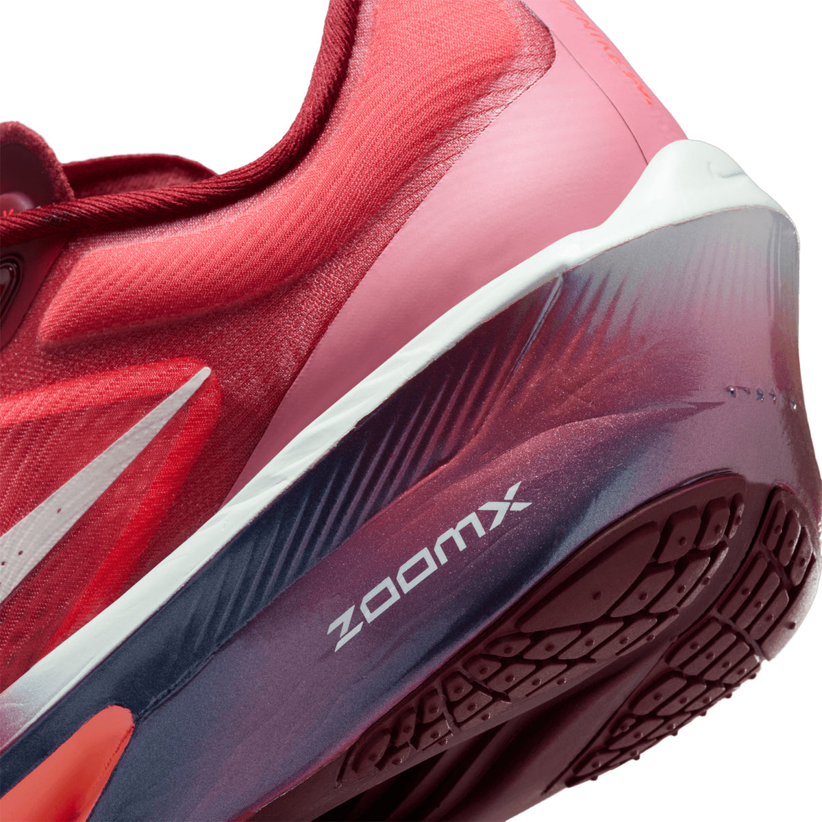 Women's Nike Zoom Fly 6 SE Running Shoes Team Red Bright Crimson Barely Green angled side and heel view showing carbon-plated ReactX foam construction for tempo runs and race day performance