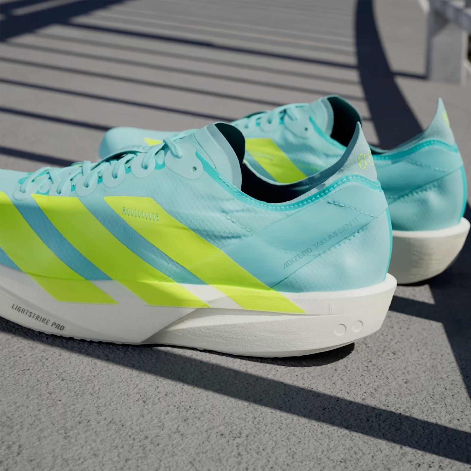 Men's Adizero Takumi Sen 11 Running Shoes Flash Aqua / Zero Metalic / Mint Ton - Achilles Heel