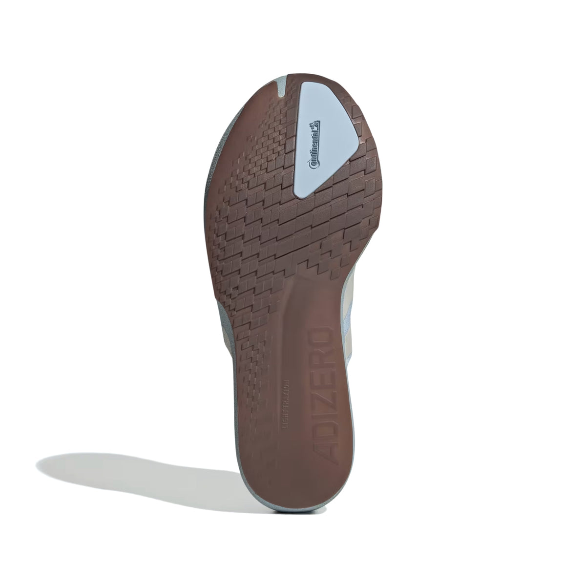 The rubber outsole of a Satisfy Men’s Adizero Adios Running Shoes Wonder Blue / Pearl Met featuring a treaded pattern and a Continental logo insert at the forefoot.