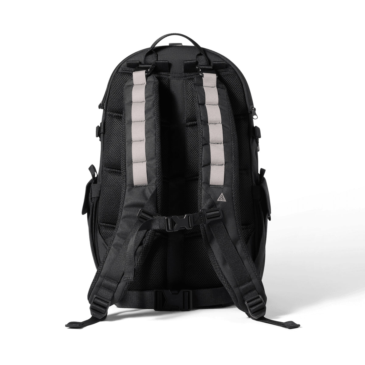 The Nike ACG Daymax 25L Backpack in Black and College Grey is shown from the back, highlighting its padded shoulder straps with light grey accents and multiple adjustment buckles.
