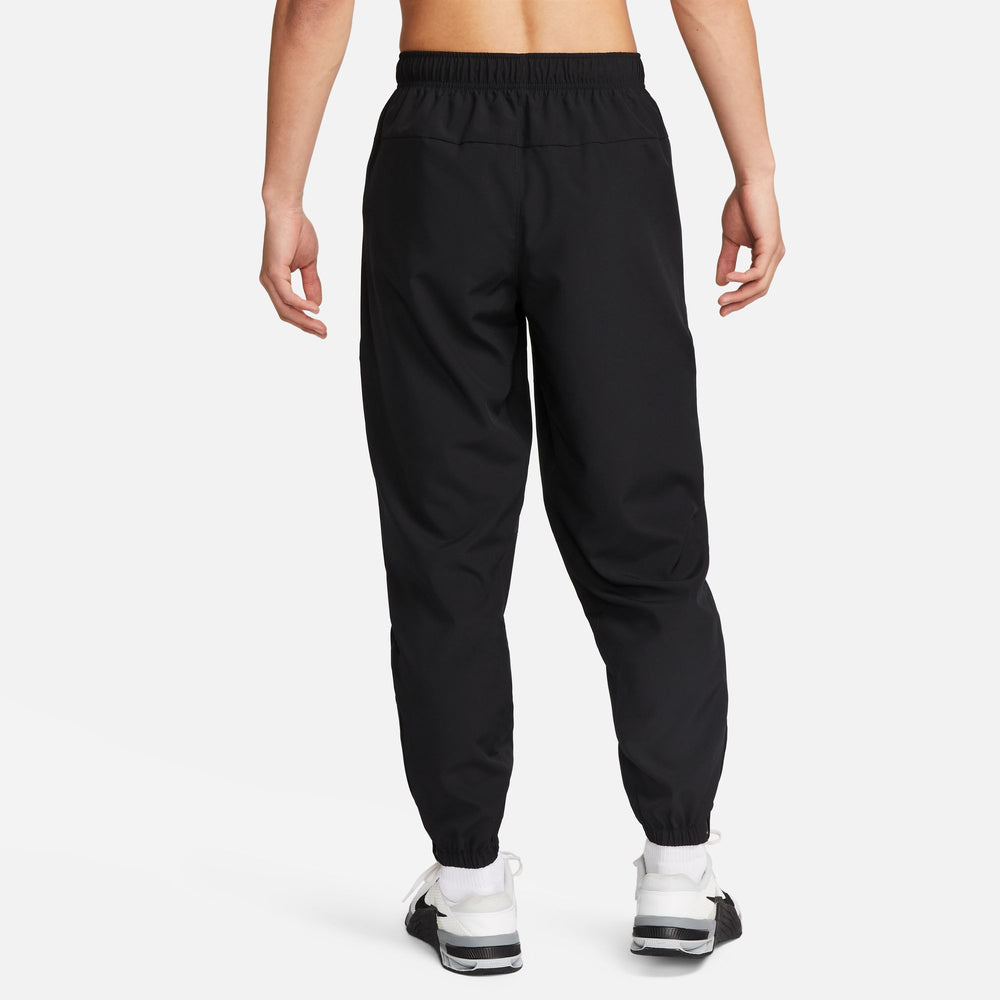 Nike Men's Dri-FIT Tapered Versatile Trousers Black / Black - achilles heel