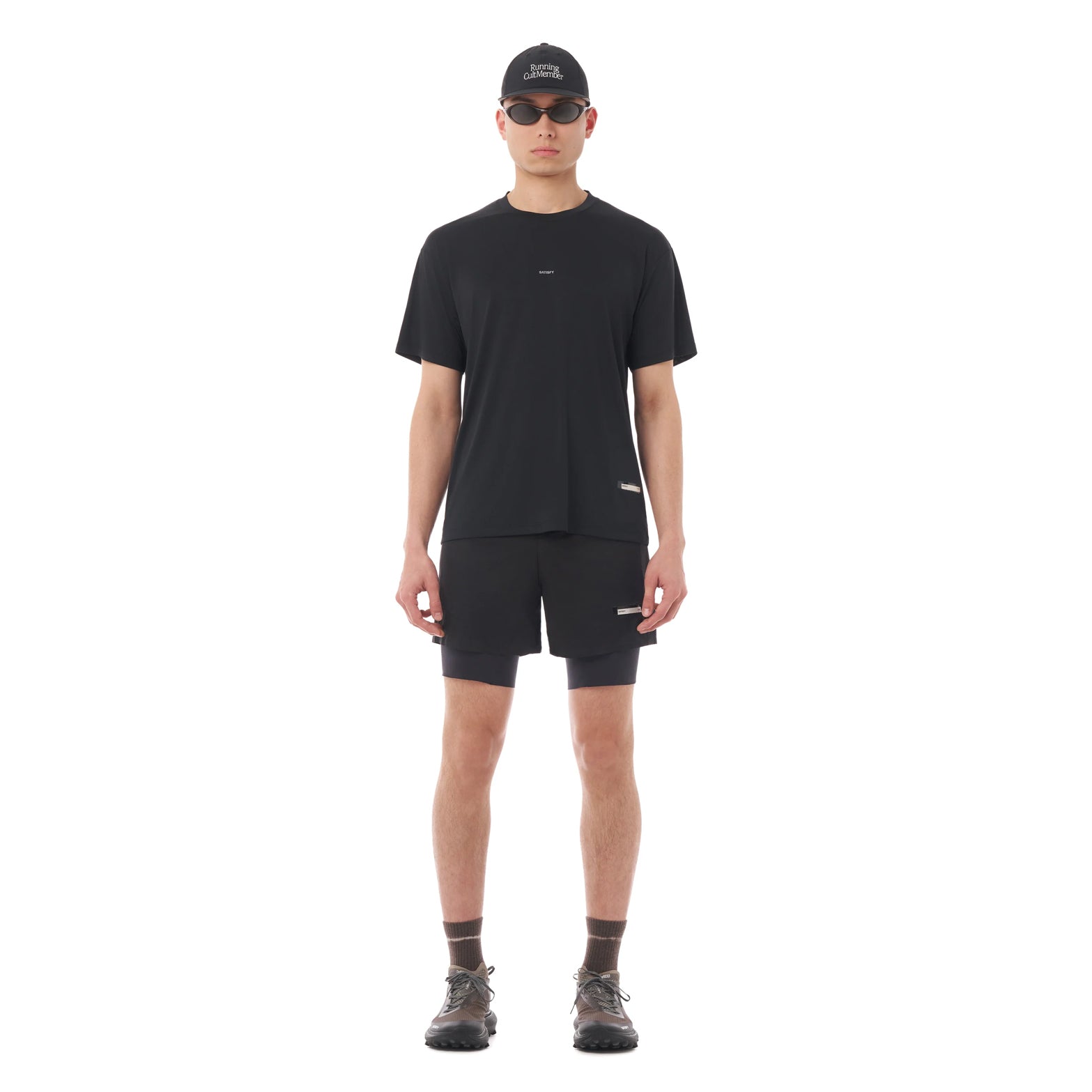 Satisfy AuraLite Tee Black full body front view on male runner showing lightweight recycled micro jersey with UV protection and fast-dry performance