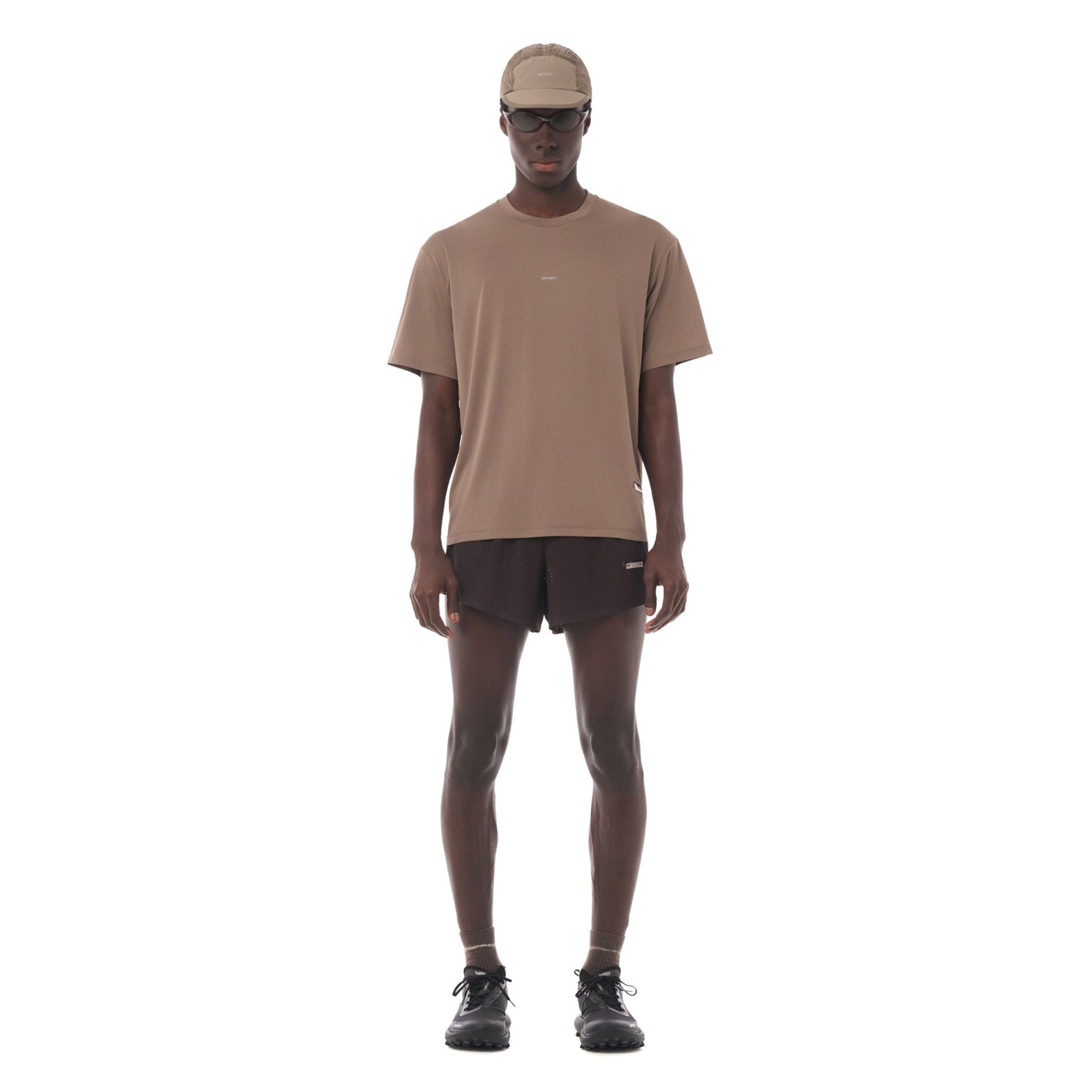 Satisfy AuraLite Tee Pigment Falcon full body front view on male runner showing lightweight recycled micro jersey with UV protection and fast-dry performance