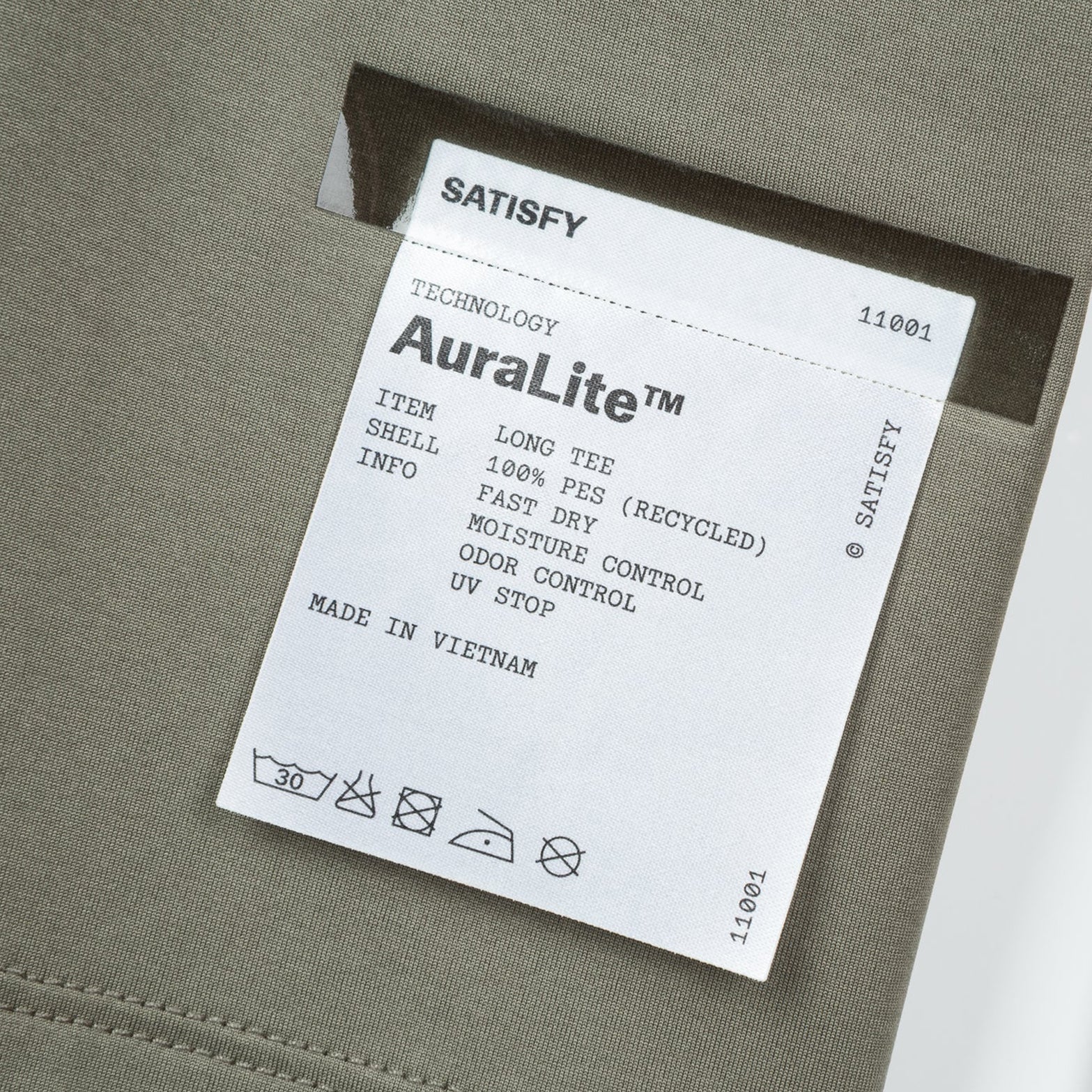 Satisfy AuraLite™ Long Tee in Dusty Olive — closeup showing fully detachable exterior care label on dusty olive AuraLite™ recycled micro jersey construction