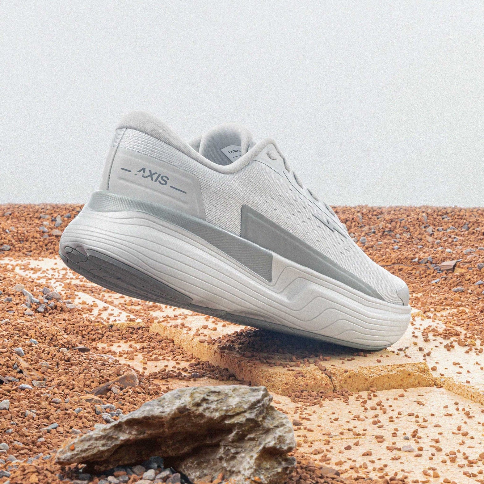 Hylo AXIS Running Shoes Grey heel view showing PureGlide SP sculpted midsole geometry with corn-derived collar and maximum cushioning construction