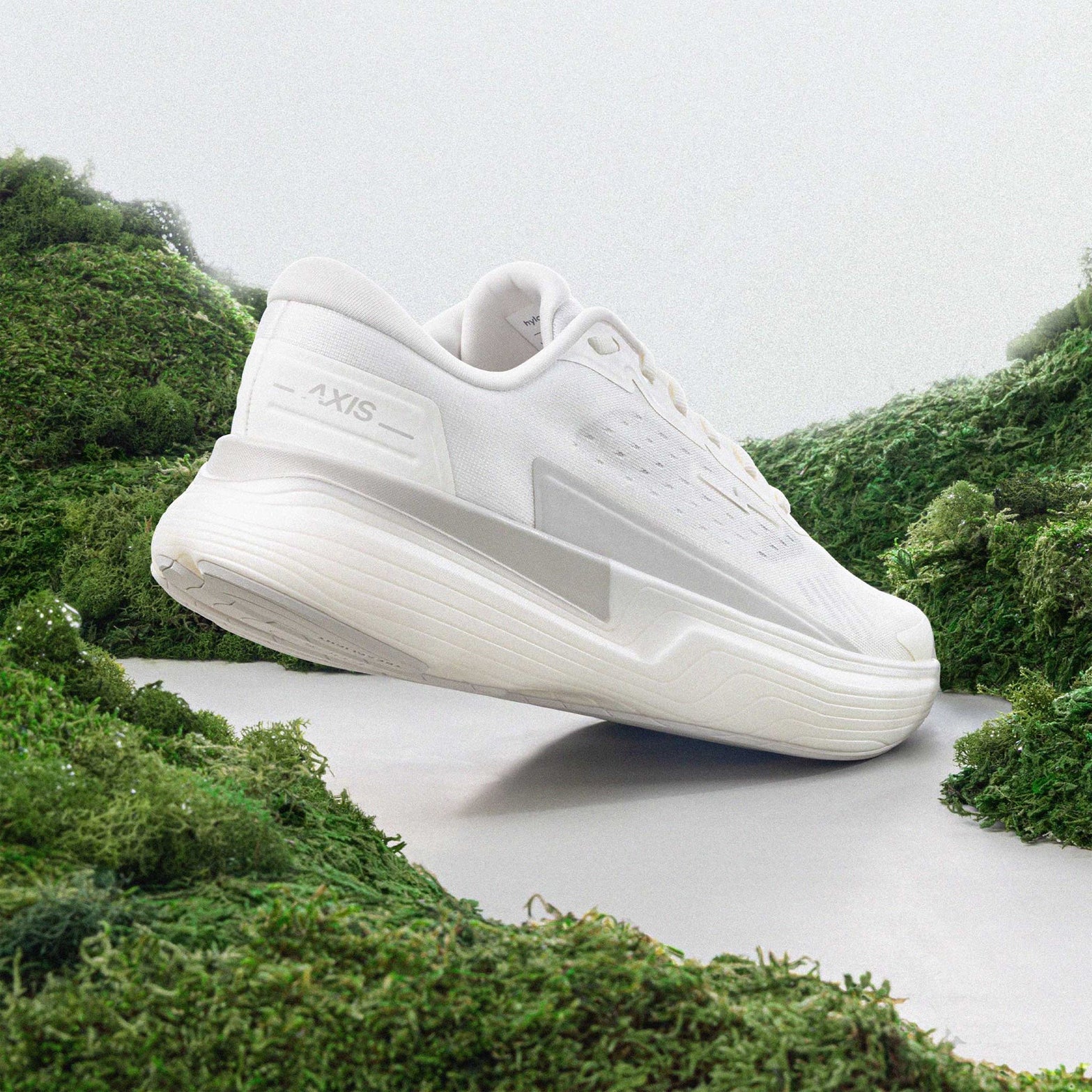 Hylo AXIS Running Shoes White Grey heel view showing PureGlide SP sculpted midsole geometry with corn-derived collar and maximum cushioning construction