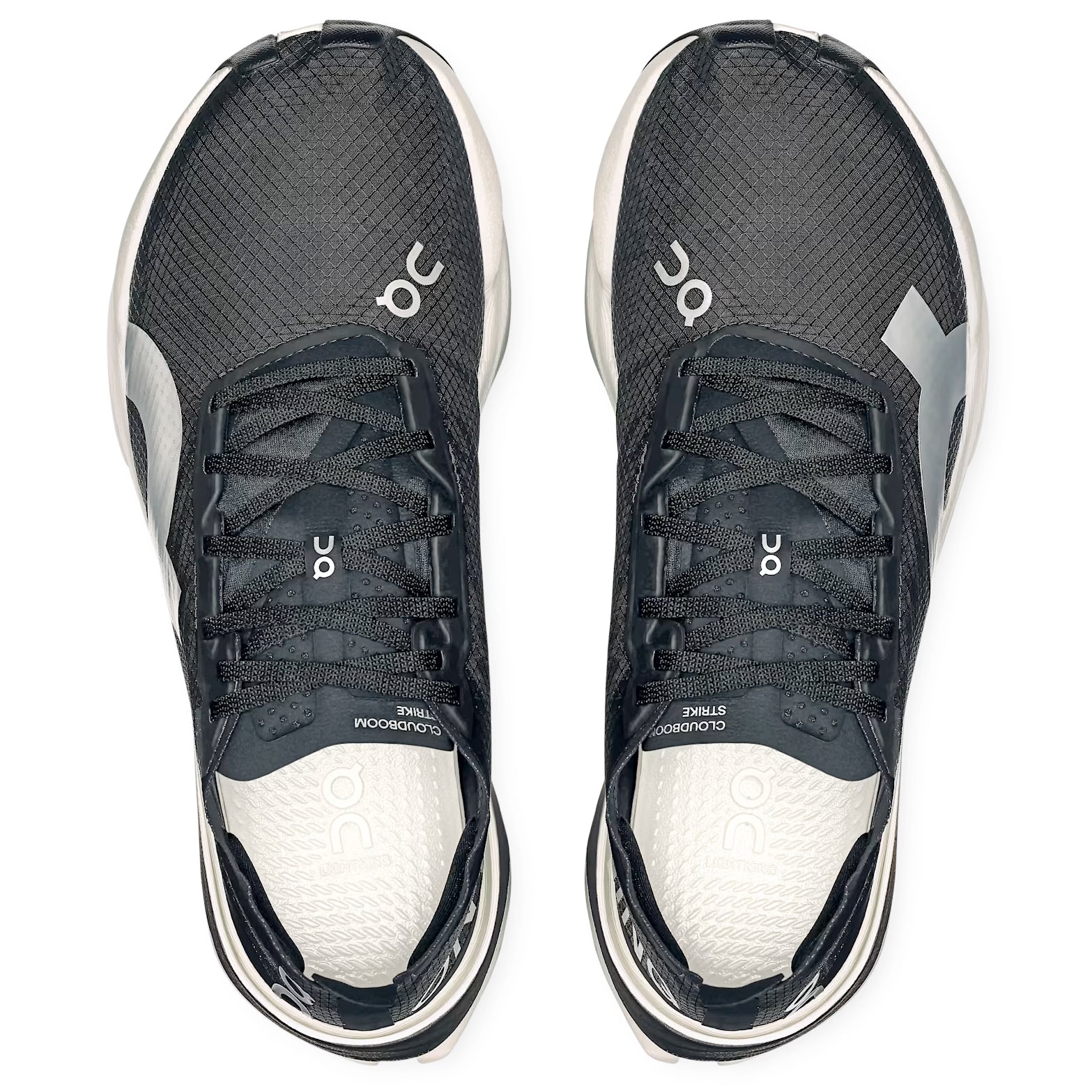 On On Women's Cloudboom Strike Black / White at Achilles Heel