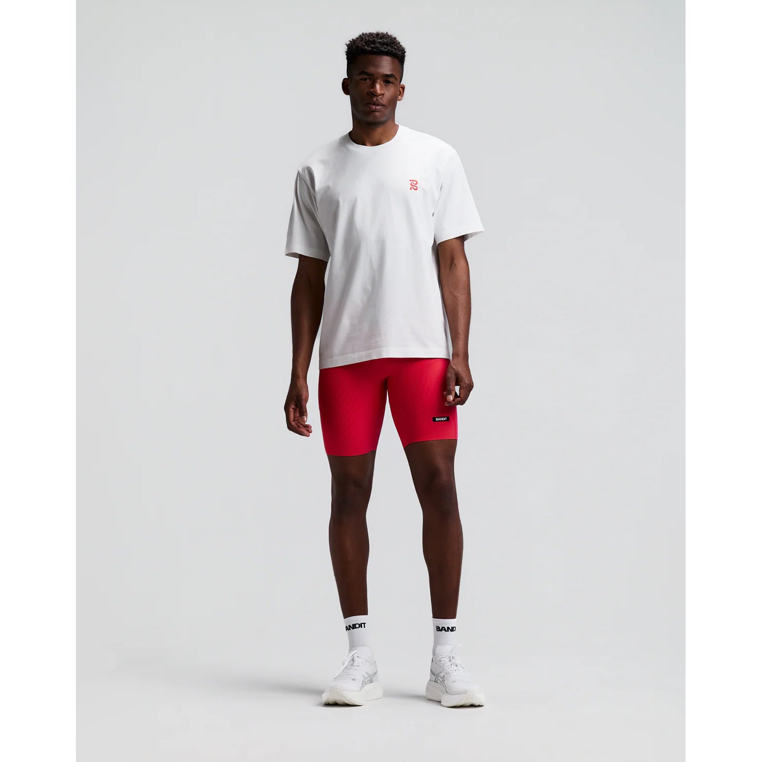 Bandit Cotton Tee Karel Crosshatch Current front full body view on model showing relaxed fit 100% combed cotton with Karel Crosshatch graphic design for comfortable everyday and post-run wear