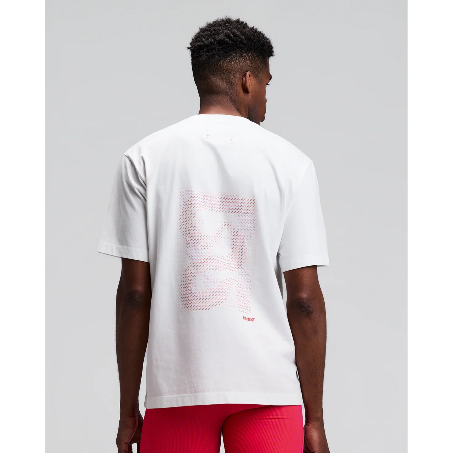 Bandit Cotton Tee Karel Crosshatch Current back view on model showing relaxed combed cotton construction with Karel Crosshatch graphic for post-run and casual wear