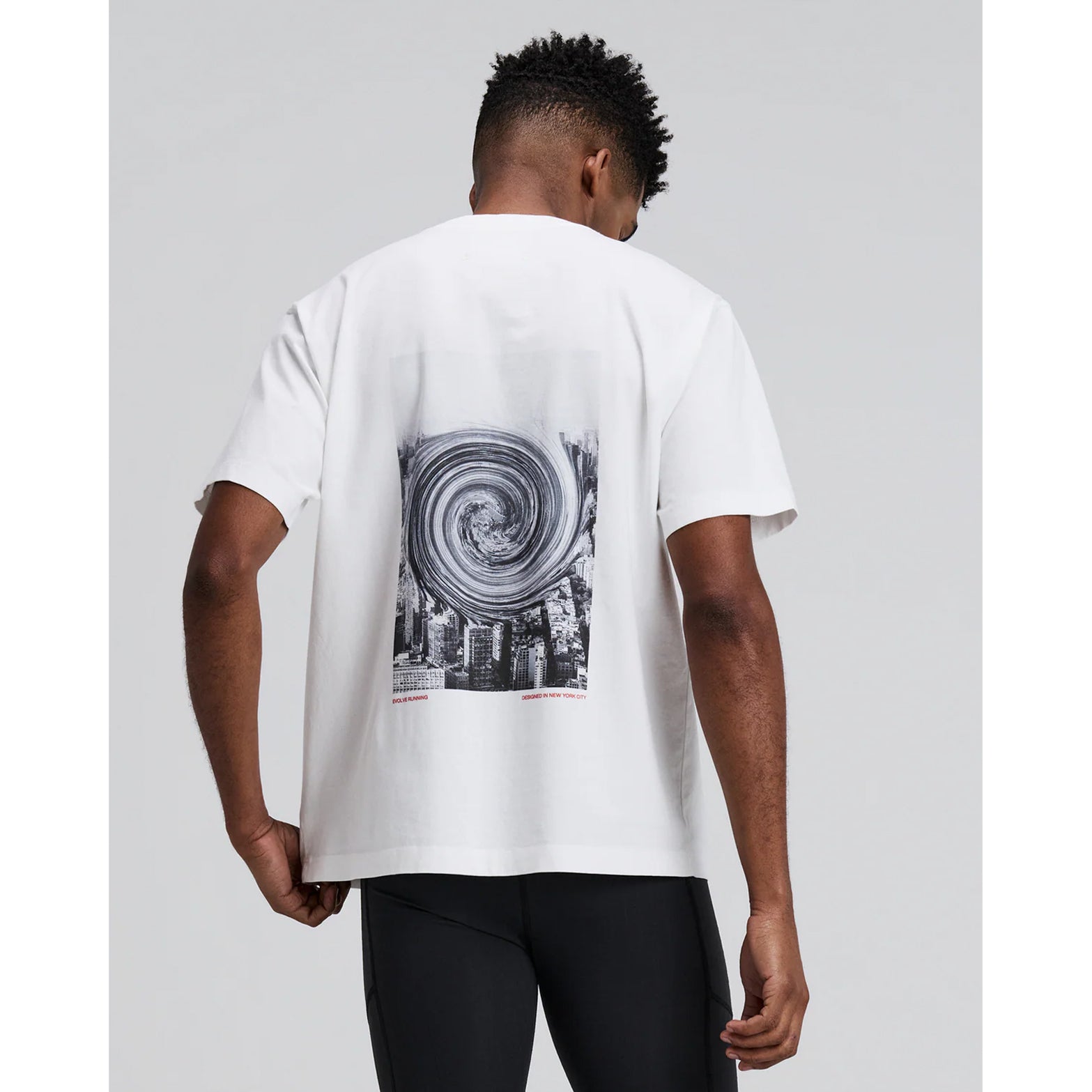 Bandit Cotton Tee Twisted City unisex in White — back view showing relaxed fit silhouette and white 100% combed cotton construction