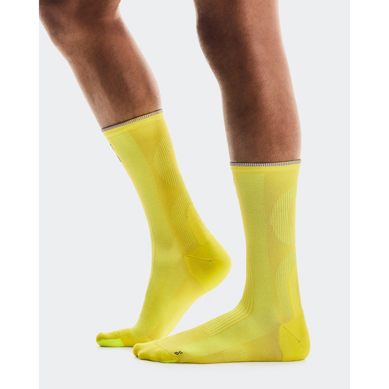 On Elite Run Sock High Lime side view showing strategic cushioning placement, Achilles tendon cushioning and lightweight breathable yarn construction