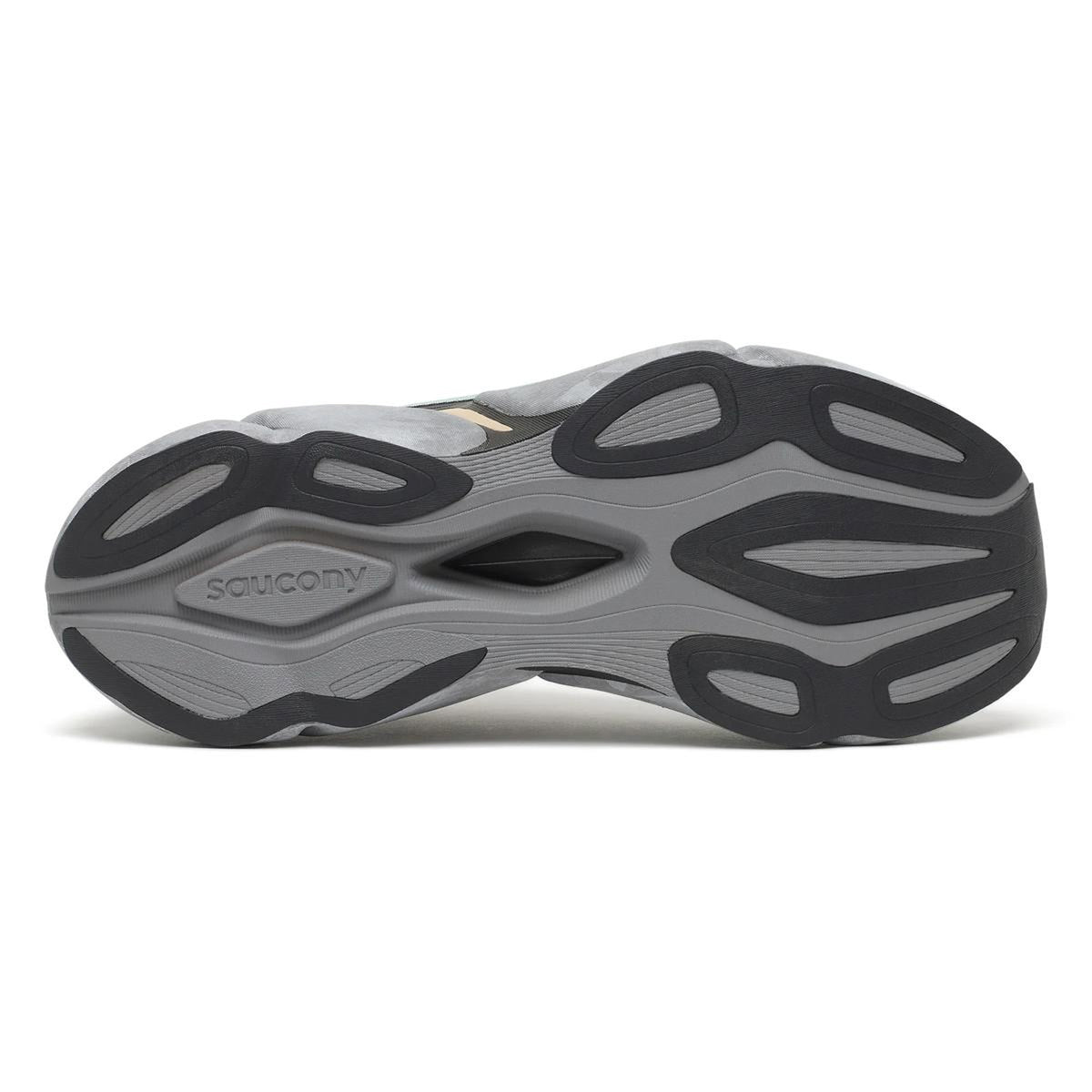 The image displays the outsole of the Saucony Endorphin Elite 3 Running Shoes in Owl / Black, featuring a gray sole with black and dark gray rubber traction patterns and branded detailing. This advanced design is further enhanced by an integrated carbon fibre plate, delivering increased propulsion and stability throughout your run.