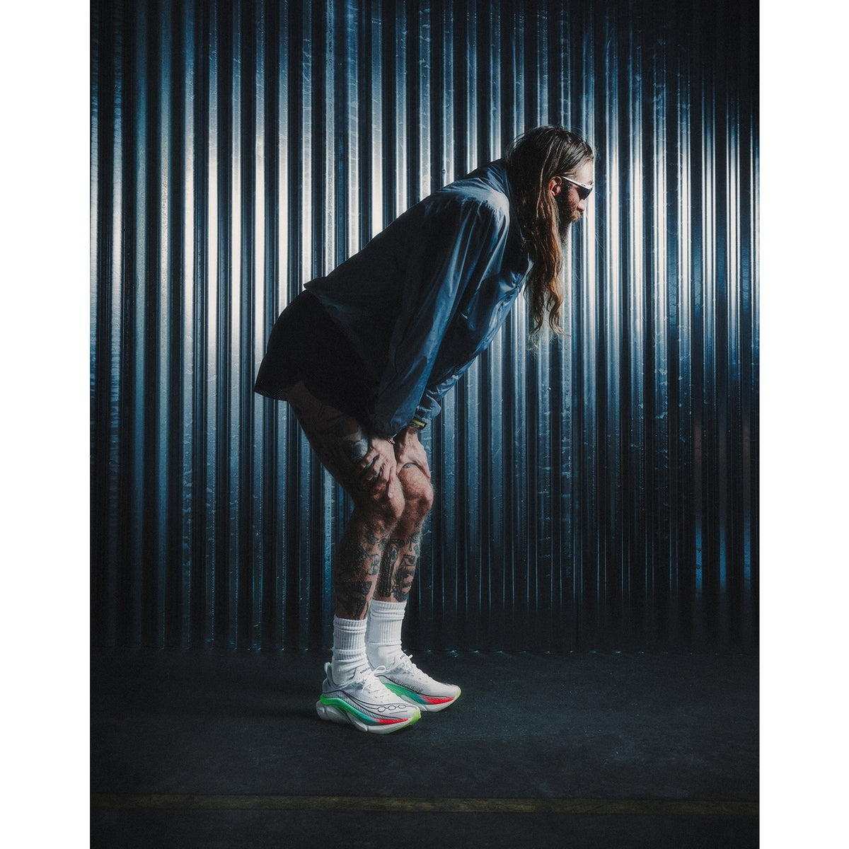 Saucony Endorphin Elite 3 Running Shoes White Multi side view on runner showing 40mm IncrediRUN foam with slotted carbon fibre plate and explosive rebound for competitive racing and personal record attempts
