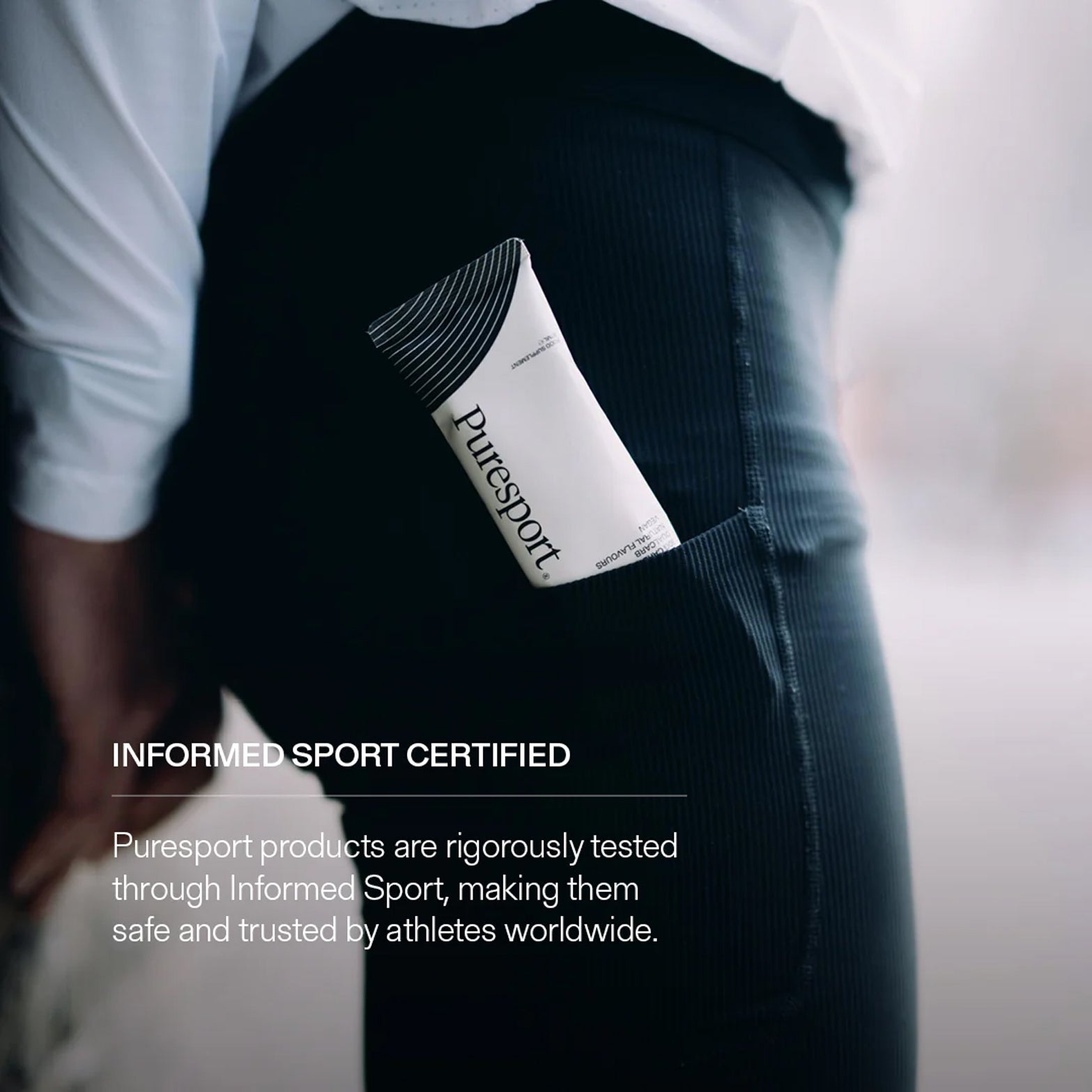 Puresport Energy Gel Unflavoured — action shot showing energy gel stored in runner's back pocket