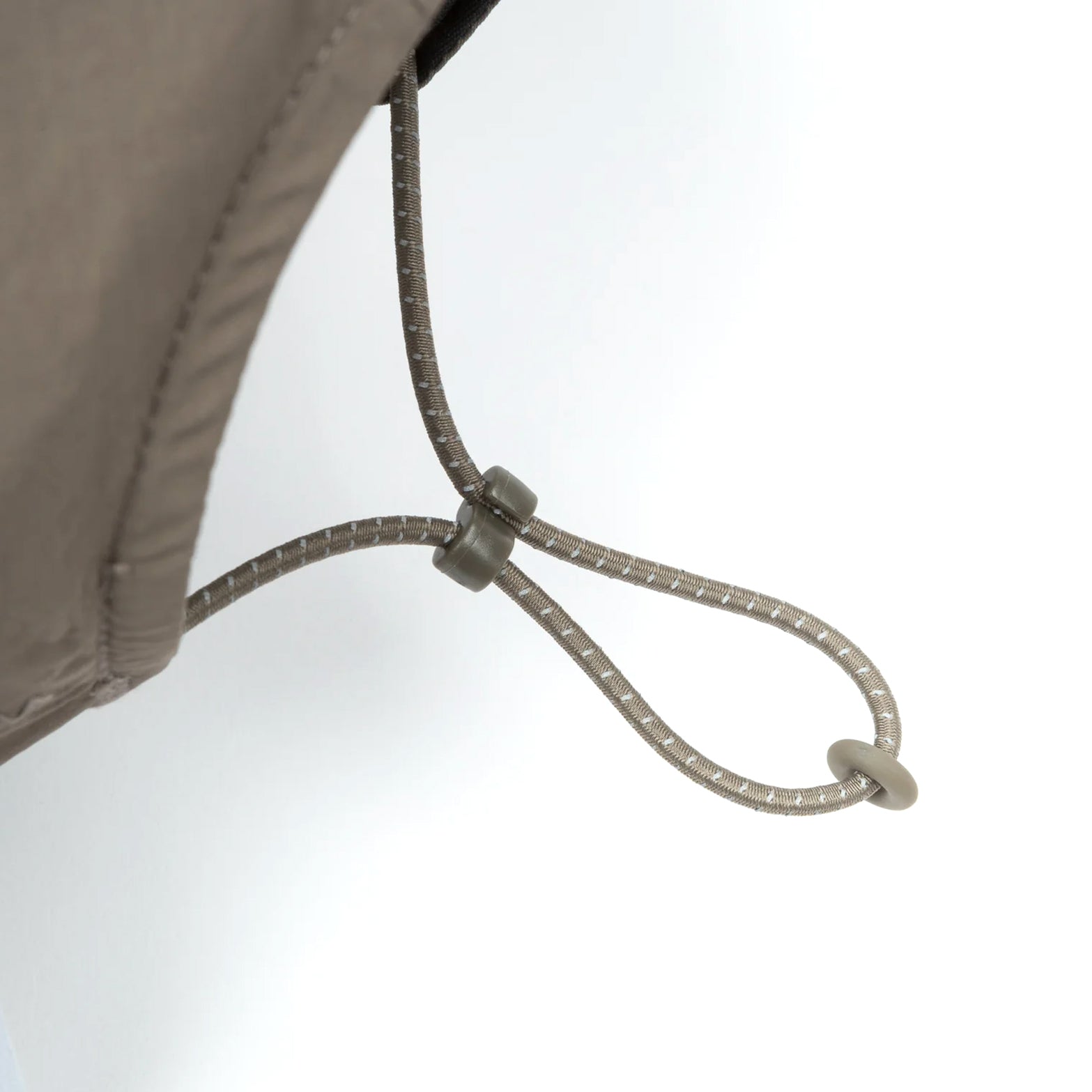 Satisfy FliteSilk™ 5 Panel Pinch Cap in Falcon Embroidery — closeup showing adjustable bungee cord system and toggle closure detail on FliteSilk™ nylon construction
