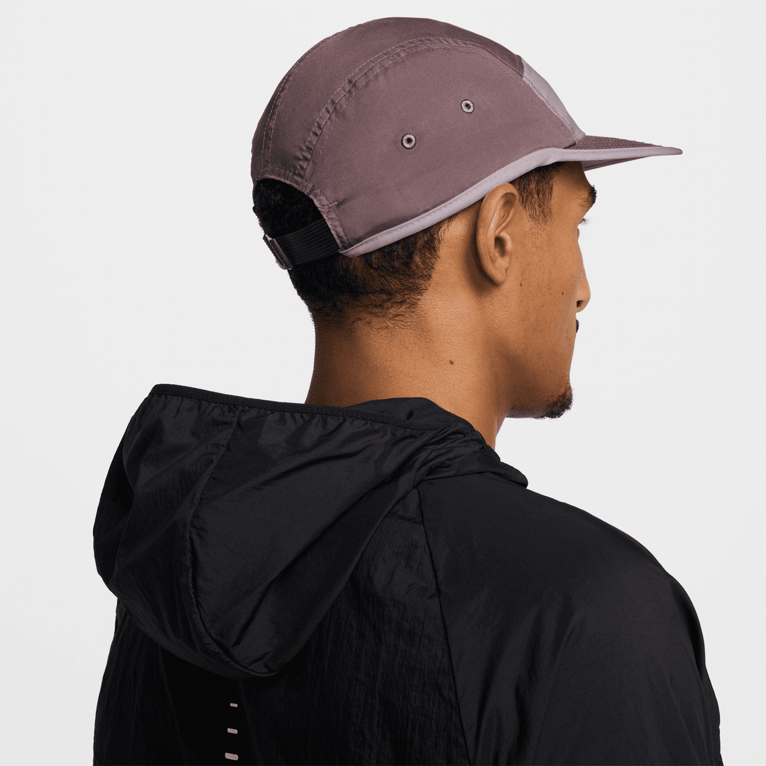 Nike Fly Unstructured Swoosh Cap Tattoo LT Violet Ore Sea Glass back view showing webbed strap closure with adjustable sizing for secure comfortable fit