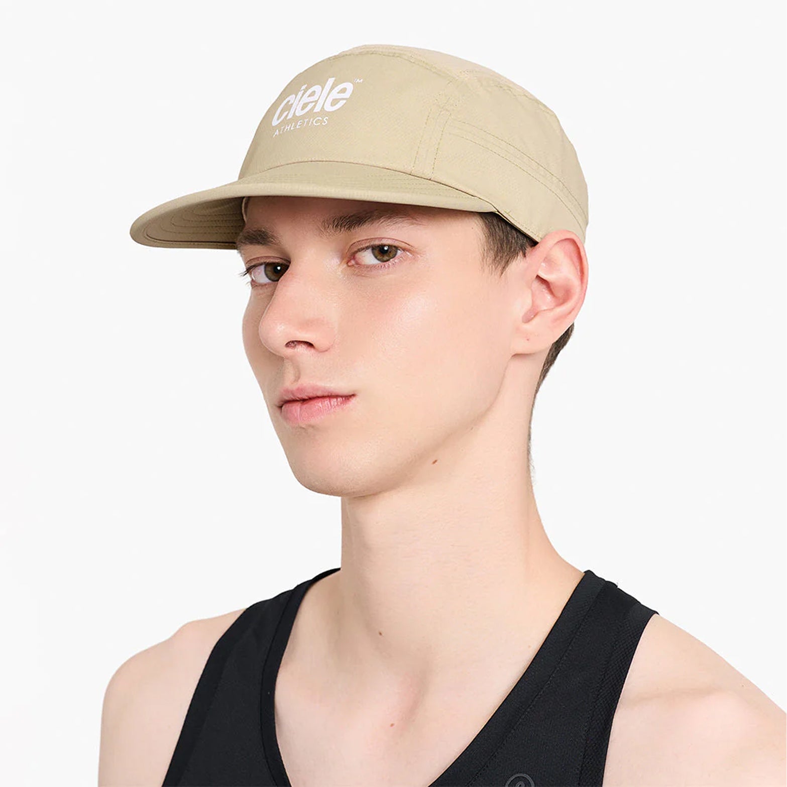 Ciele GOCap Classic Athletics Safari side view on runner showing 5-panel construction and ventilation panels