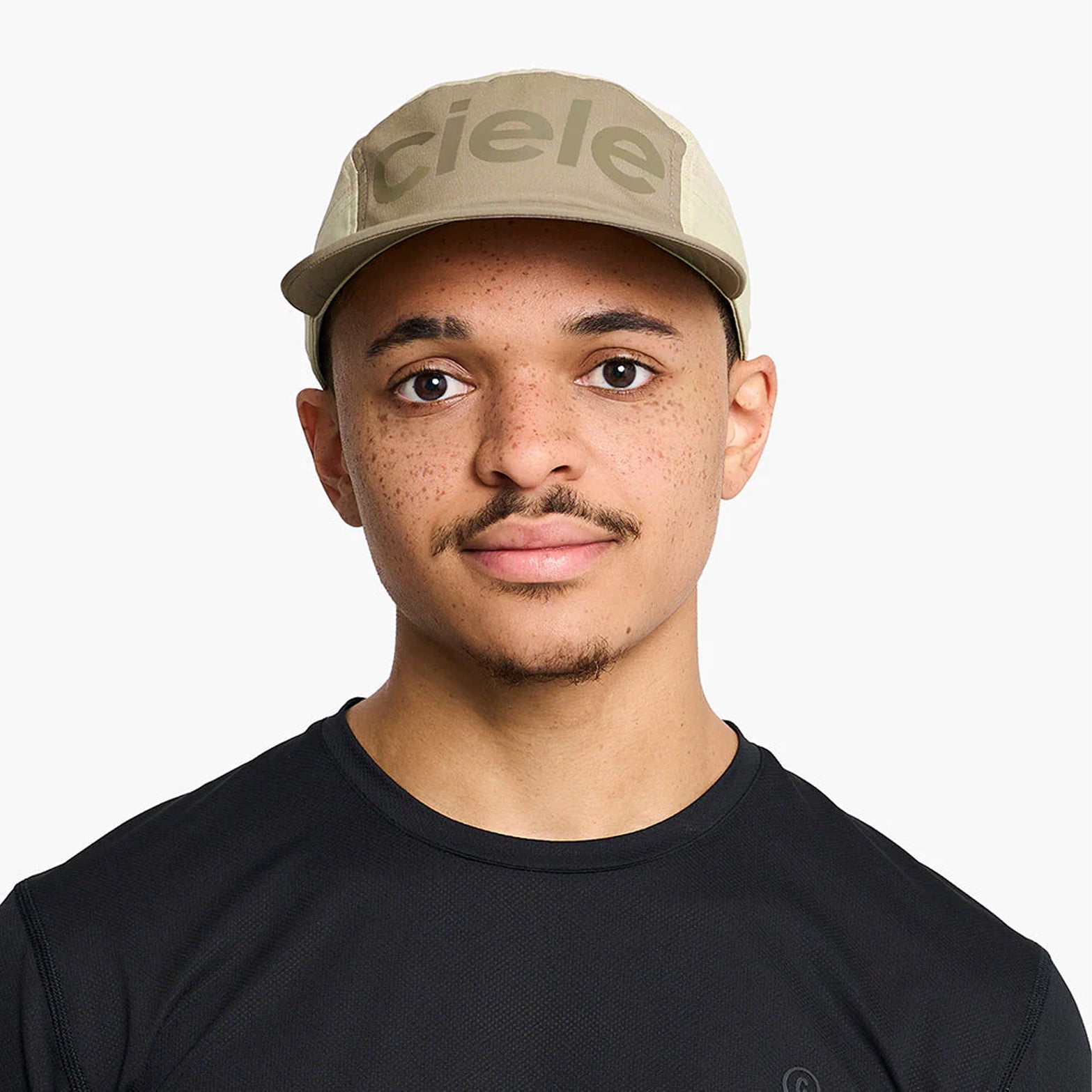 Ciele GOCap Comp Century Canvas Safari front view on runner showing fitted comfort with FLEXweave stretch fabric and COOLmatic PLUS MIKRAmesh for breathable running