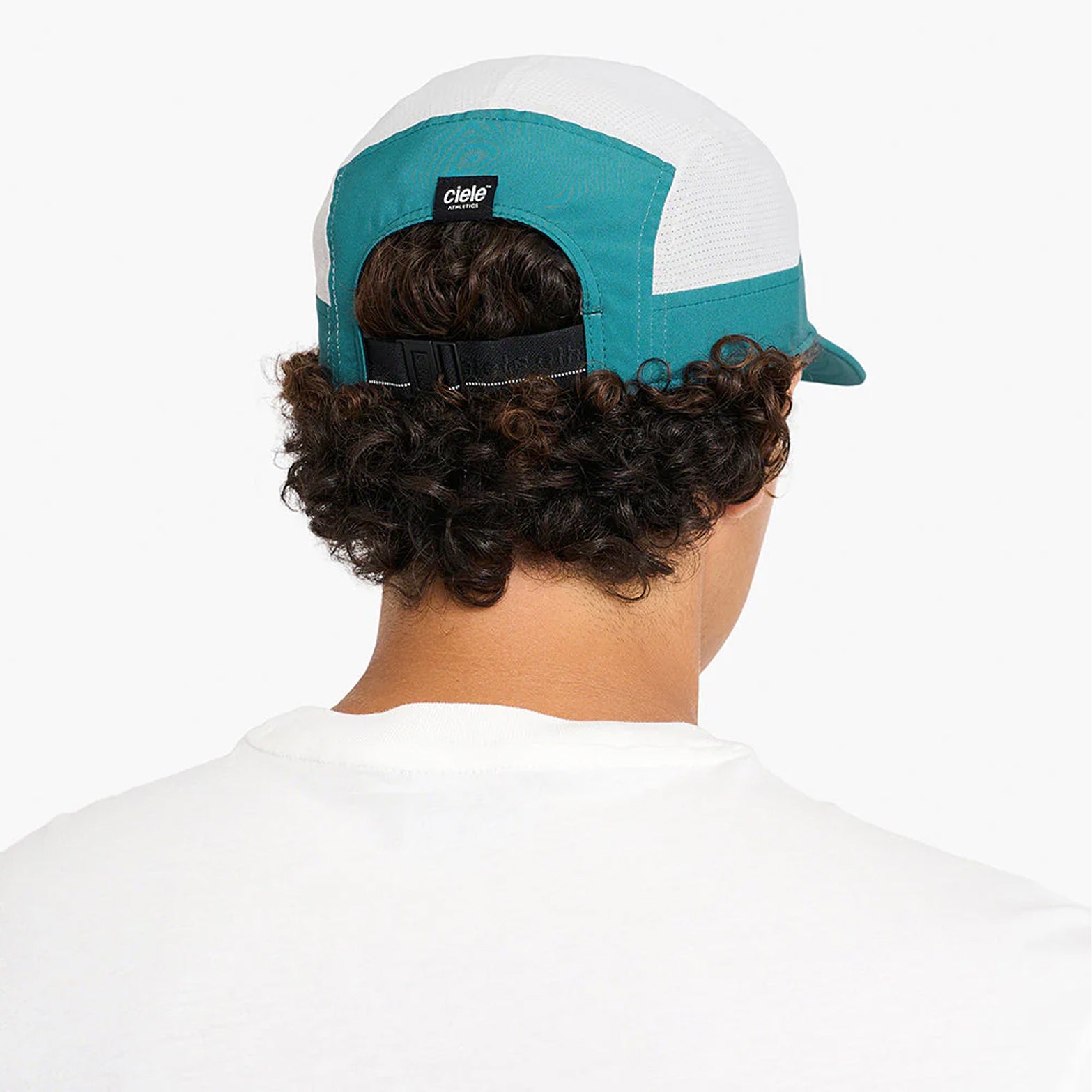 Ciele GOCap Comp Century Harbor Light Grey back view on runner showing reflective detailing for night run visibility with fast-drying mesh construction