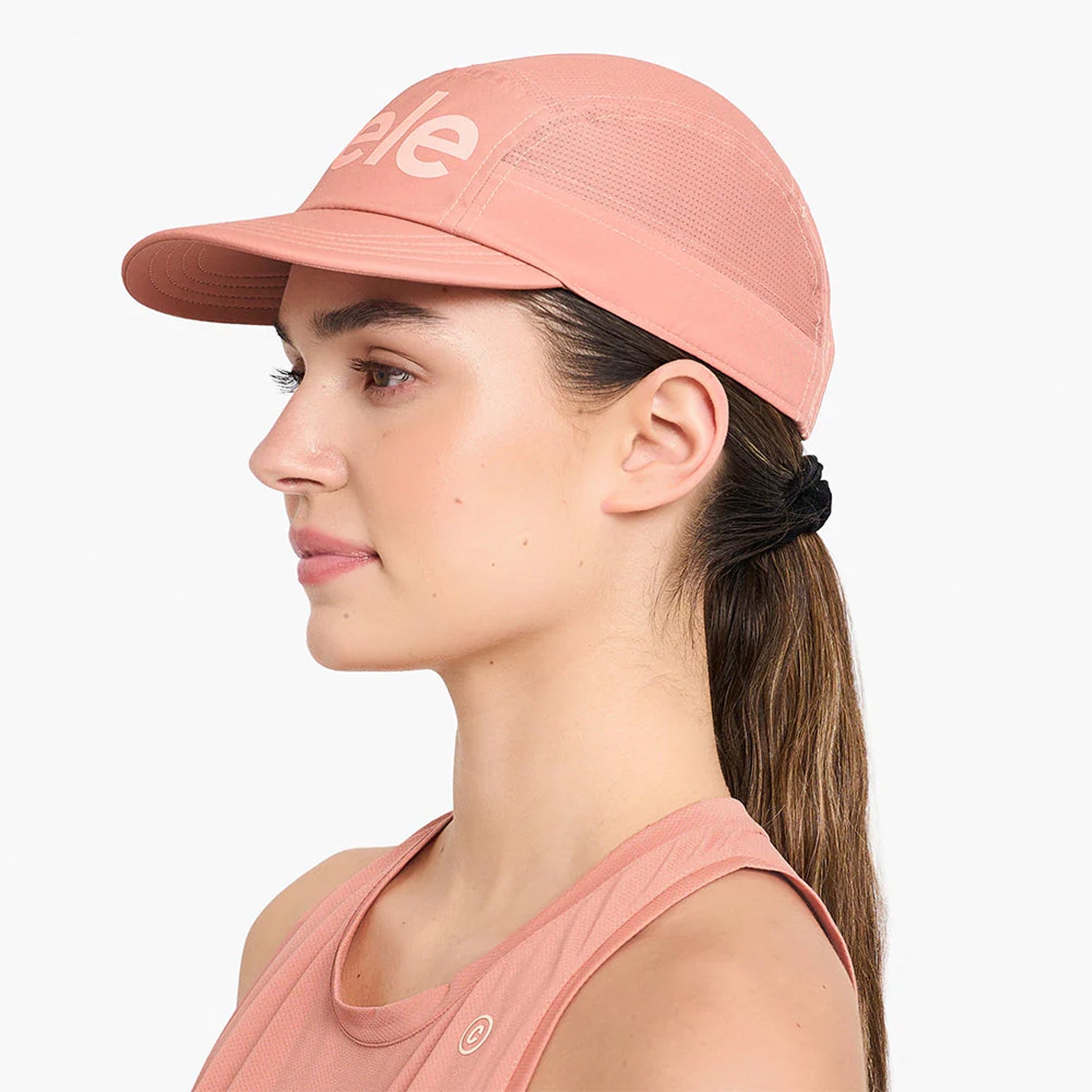Ciele GOCap Comp Century Rose Dawn side view on runner showing UPF 50+ sun protection with anti-odour COOLmatic PLUS mesh for performance running