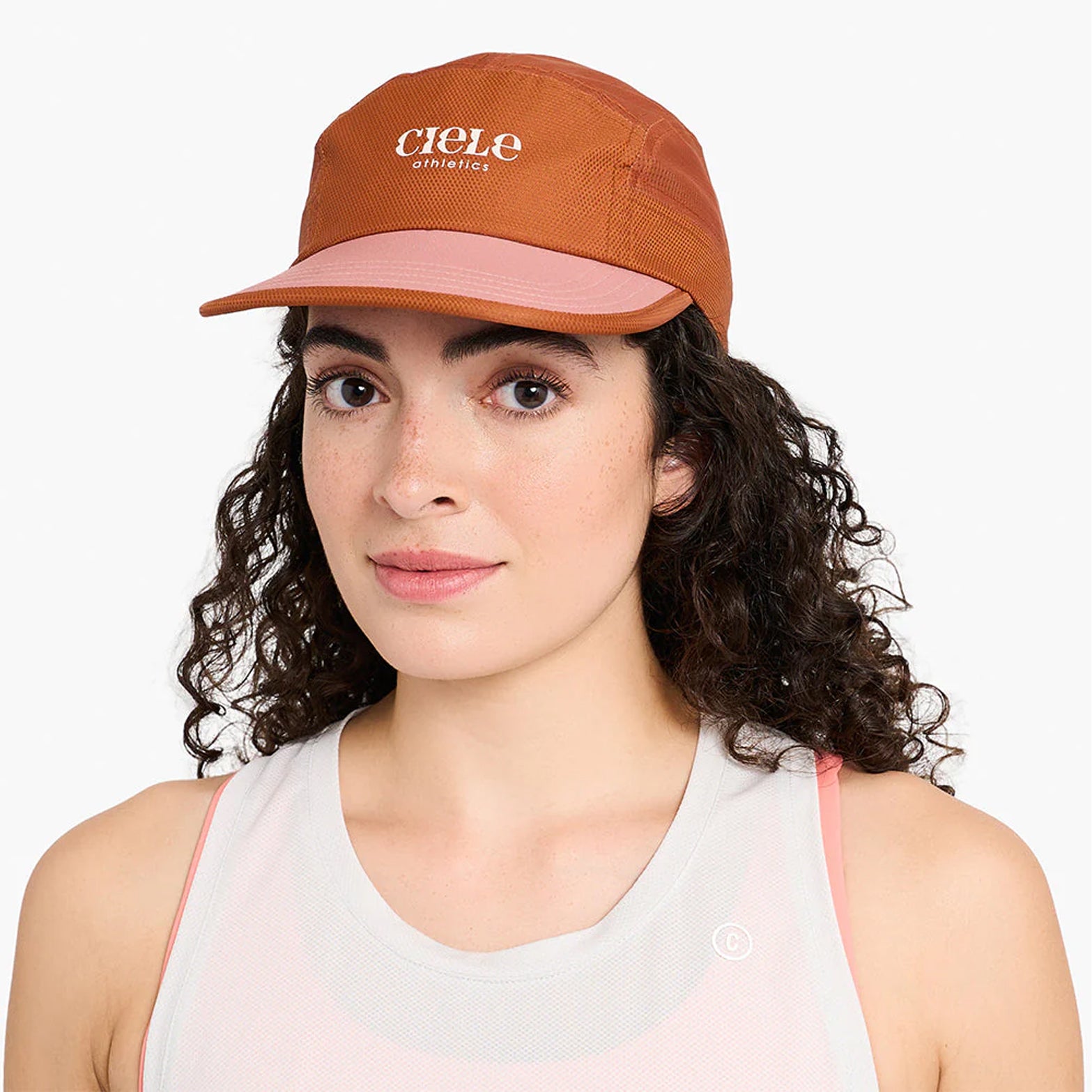 Ciele GOCap EQ Nouveau GingerBread front view on runner showing SOFTflat brim and versatile low-key aesthetic