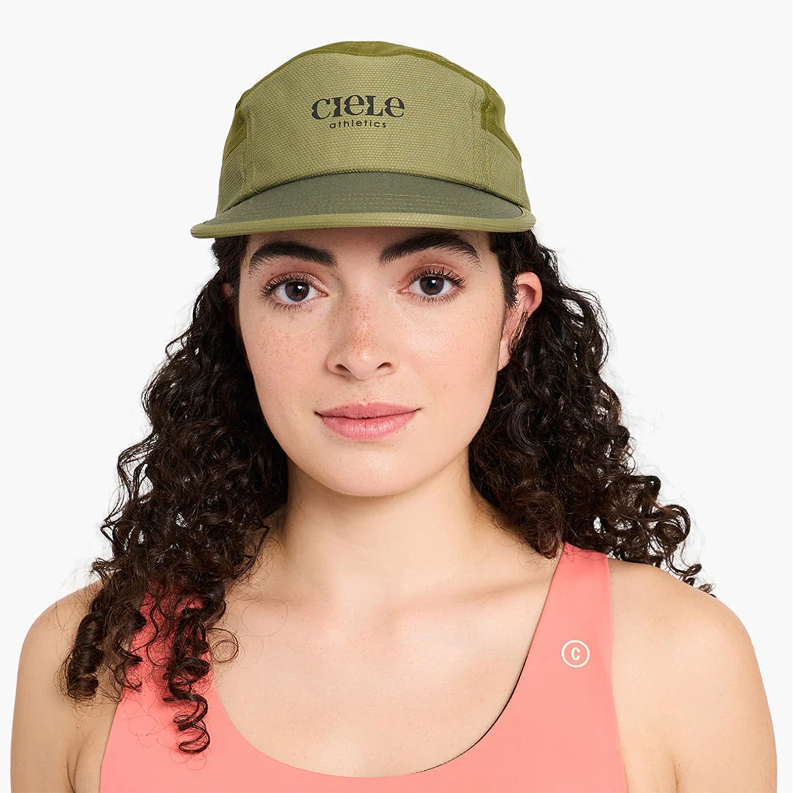 Ciele GOCap EQ Nouveau Terrain front view on runner showing SOFTflat brim and versatile low-key aesthetic