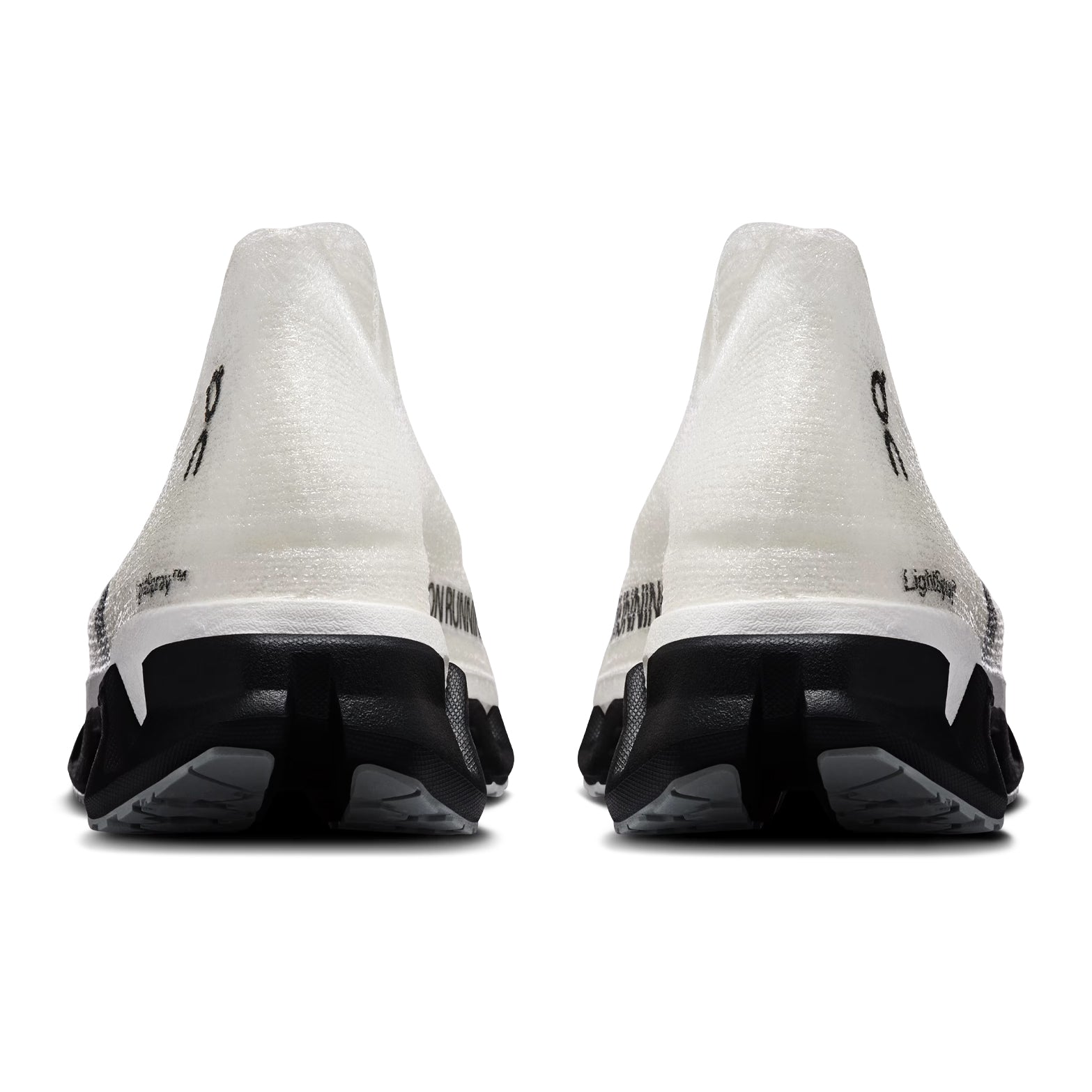 On Cloudmonster 3 Hyper LS women's running shoe in Black / Apollo — heel view showing enhanced rocker geometry, seamless construction and apollo CloudTec® midsole contrast with Helion™ foam base