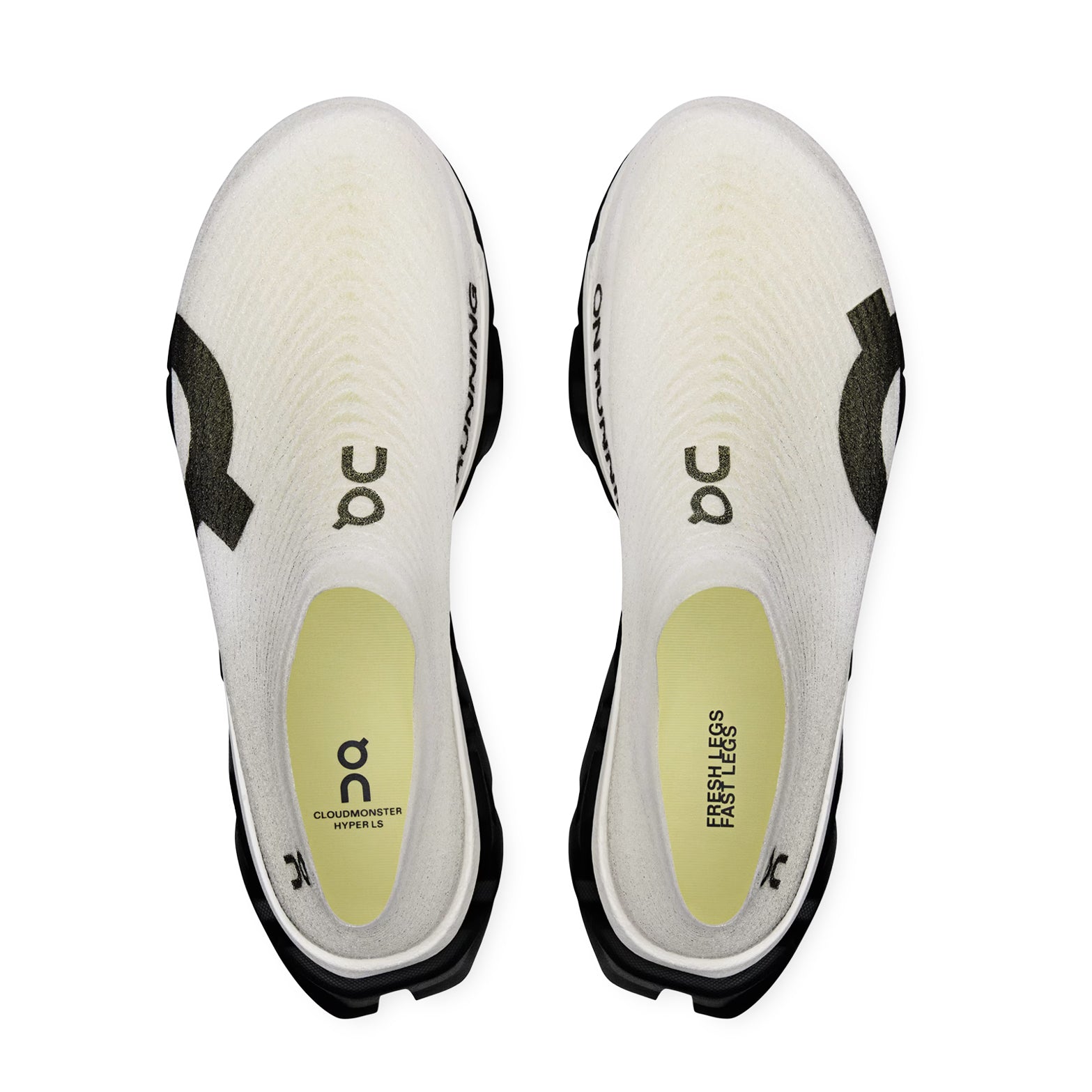 On Cloudmonster 3 Hyper LS women's running shoe in Black / Apollo — top-down view showing black LightSpray™ seamless one-piece upper with sock-like fit and lace closure with apollo detailing