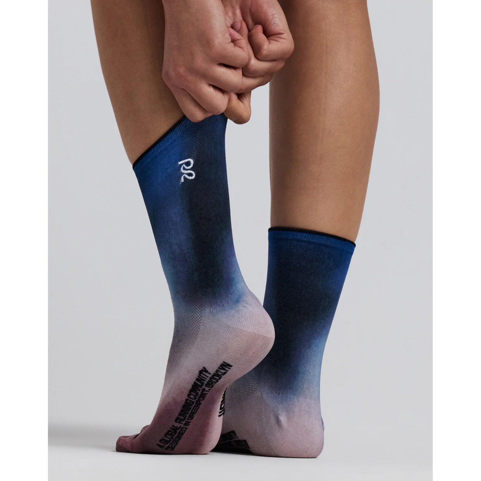 Bandit Lite Run™ Quarter Socks 2 Pack in Flow State Aegean Multi — closeup showing ribbed ankle detail, flow state aegean multi knit Bandit branding and honeycomb mesh crown construction