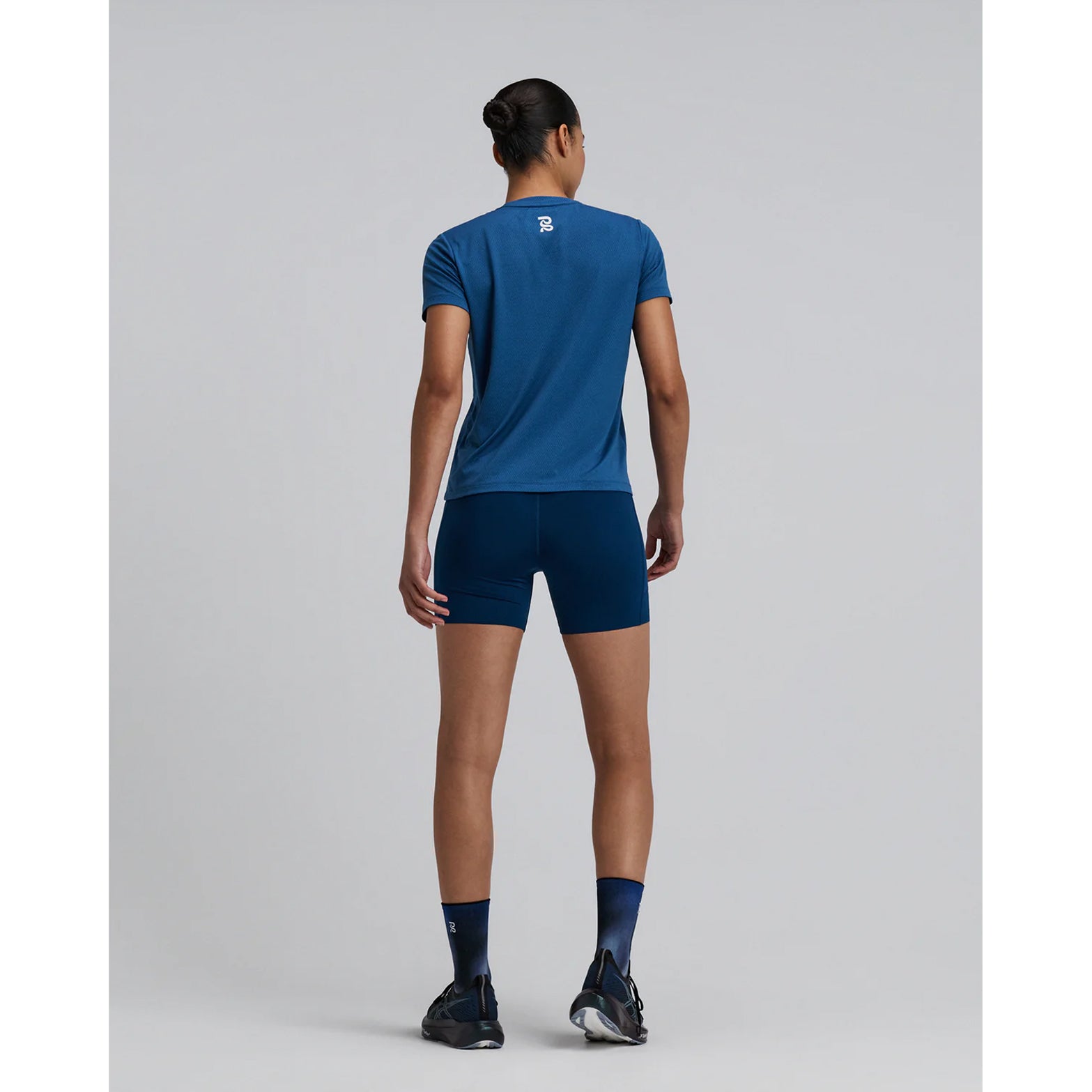 Bandit Lite Run™ Quarter Socks 2 Pack in Flow State Aegean Multi — full body back view worn on model showing quarter-length cut, ribbed ankle detail and flow state aegean multi knit Bandit branding with running kit