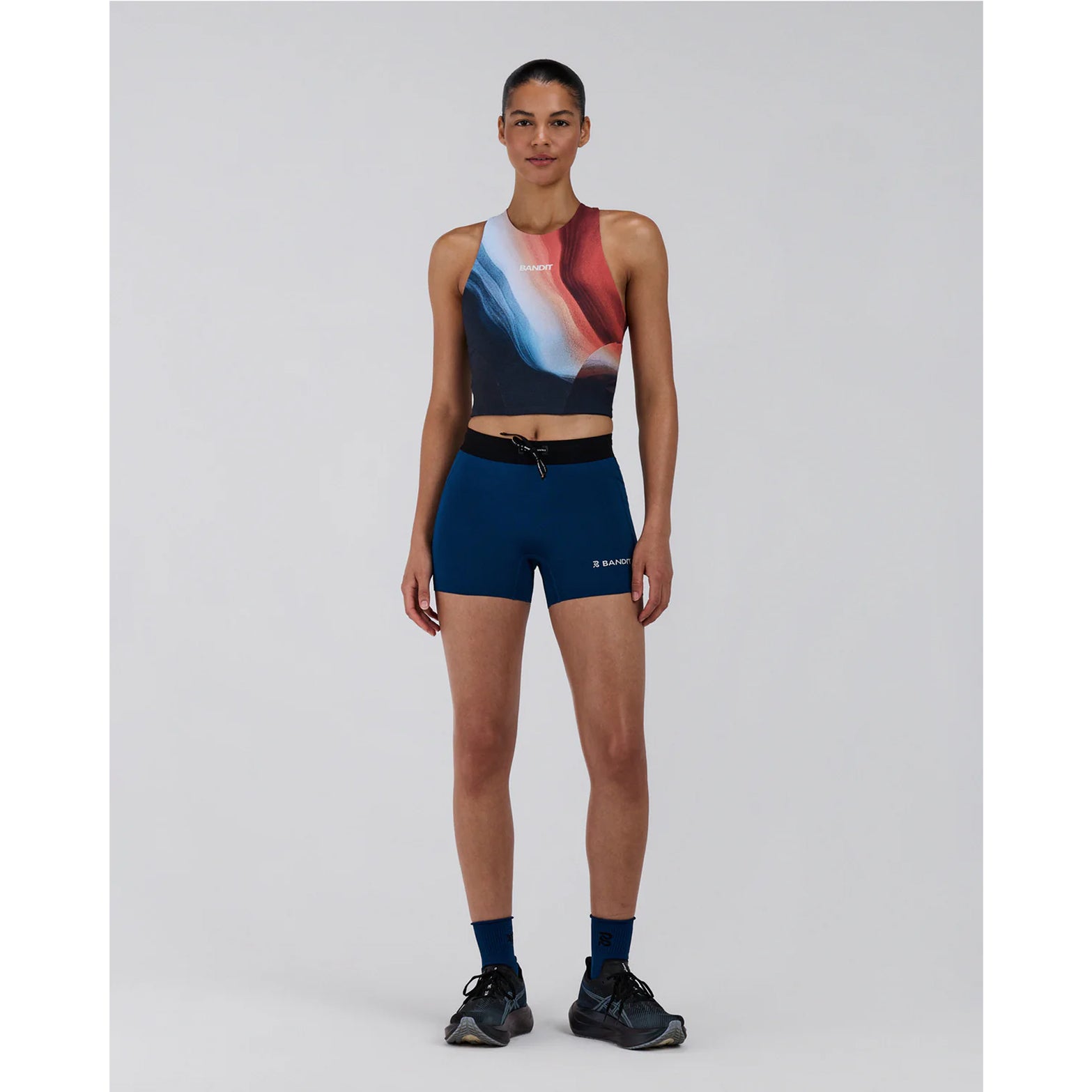 Bandit Lite Run Ribbed Quarter Socks Aegean full body front view on runner showing lightweight breathable quarter-length socks with moisture-wicking construction