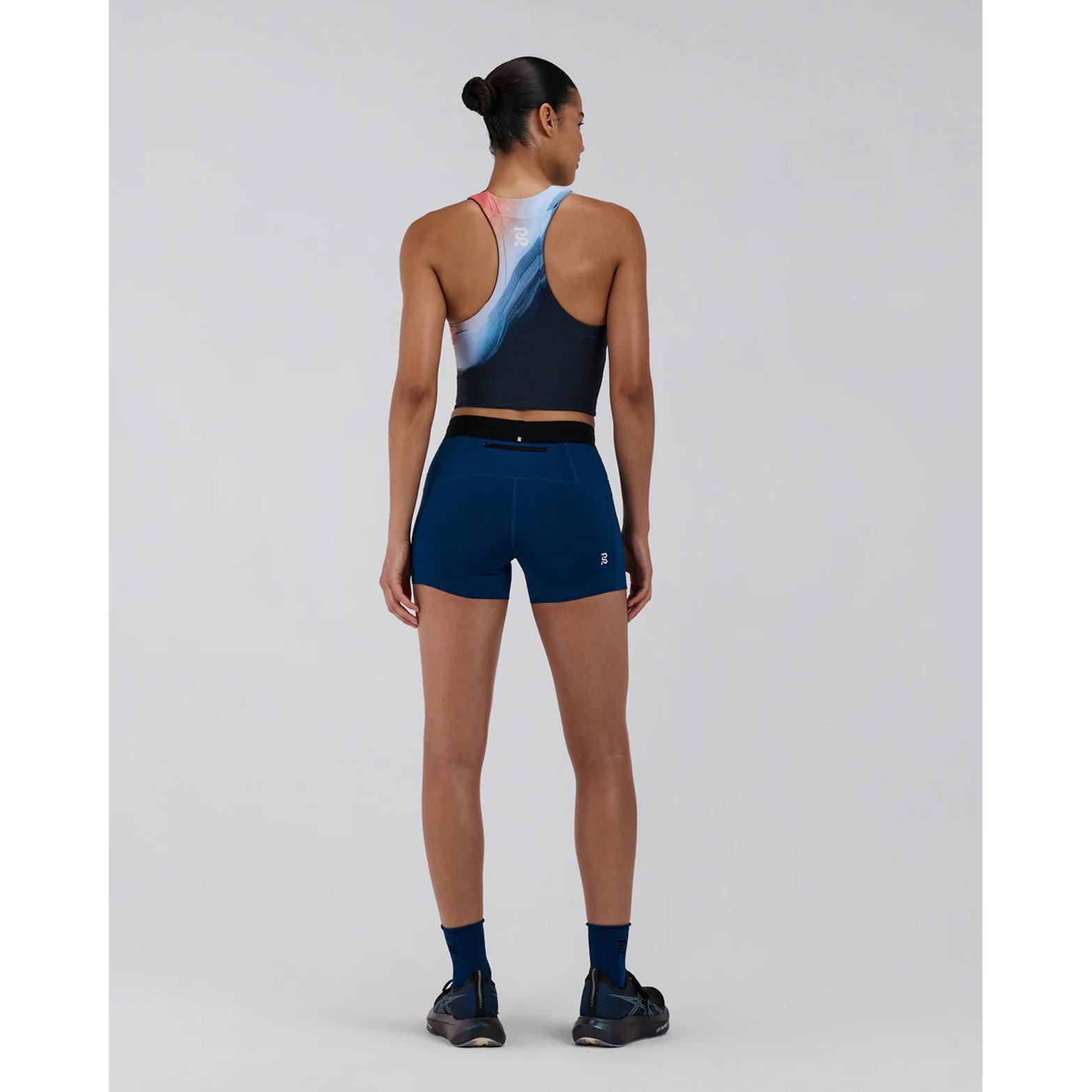 Bandit Lite Run Ribbed Quarter Socks Aegean full body back view on runner showing ribbed ankle detail with ultra-breathable honeycomb mesh and anti-microbial odourless construction