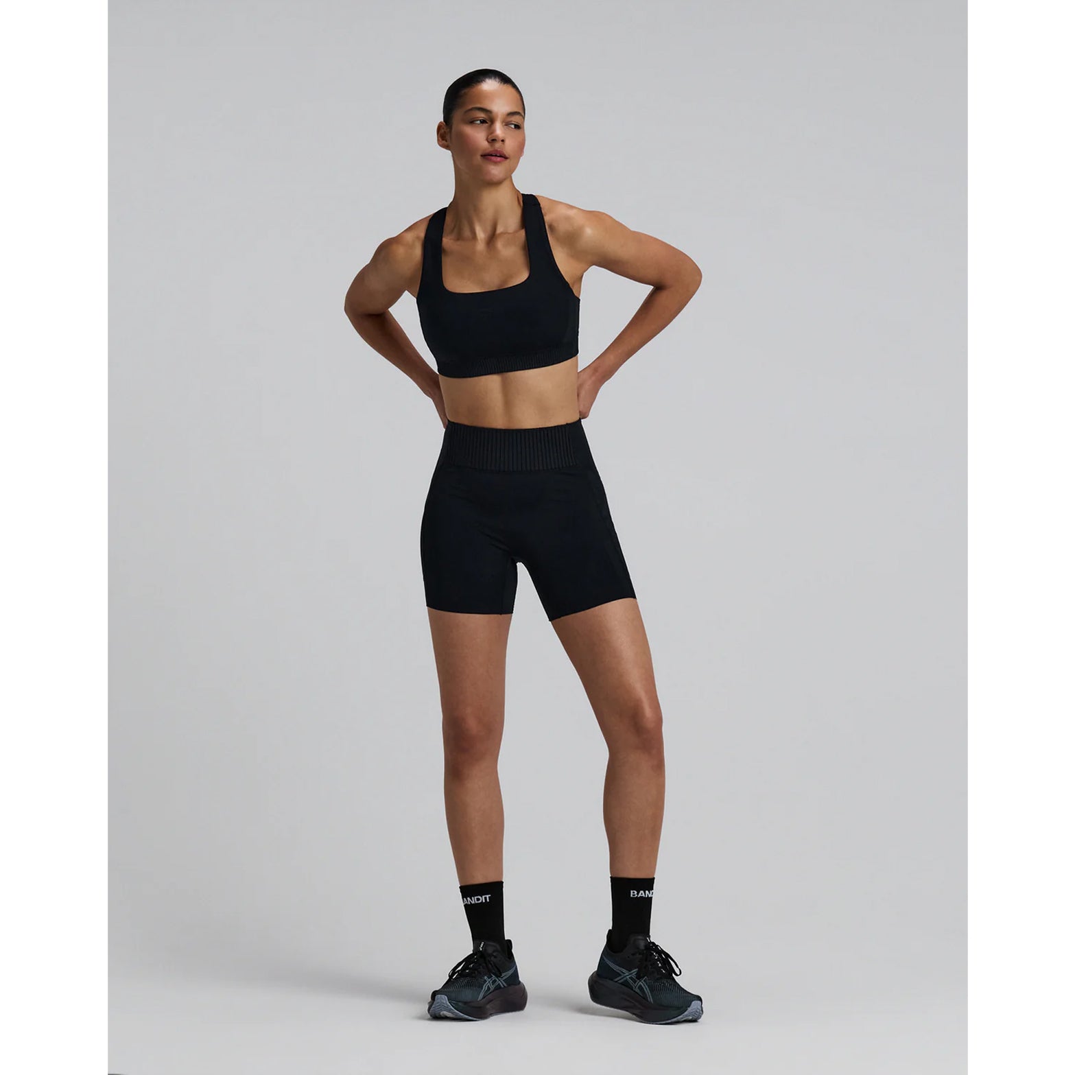 Bandit Lite Run Spring Motif Quarter Socks Black White full body front view on runner showing lightweight breathable quarter-length socks with moisture-wicking Coolmax technology