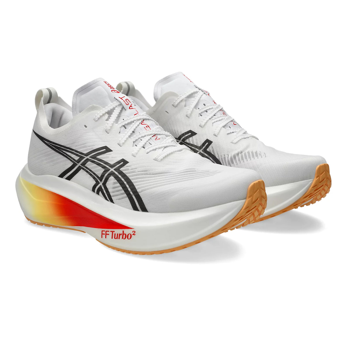 A pair of white running shoes with black stripes, orange and yellow gradient accents on the sole, and gum-colored outsoles. The shoes have FFTurbo² text on the midsole.