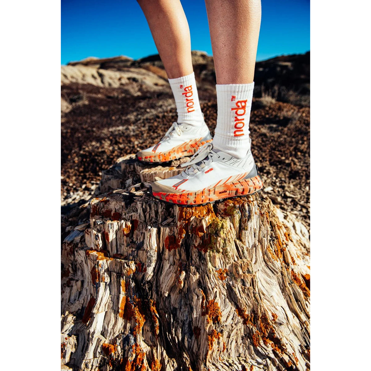 norda 001A Trail Running Shoes RZ Fireclay worn by runner showing ultra-distance trail running performance and Vibram Mega Grip traction