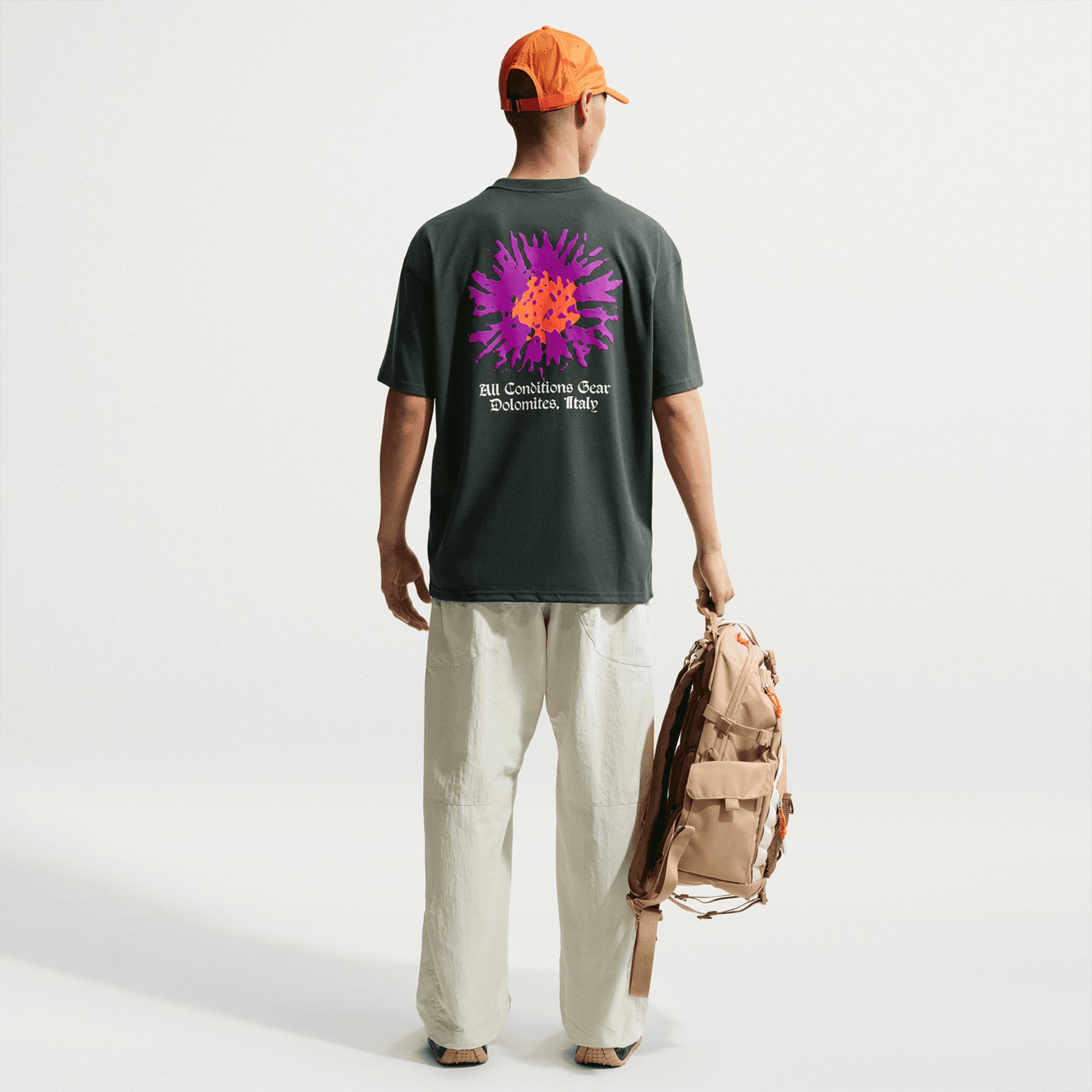 Nike ACG men's Dri-FIT tee in Black Spruce — full body back view worn on model showing black spruce Dri-FIT moisture-wicking construction and relaxed everyday fit