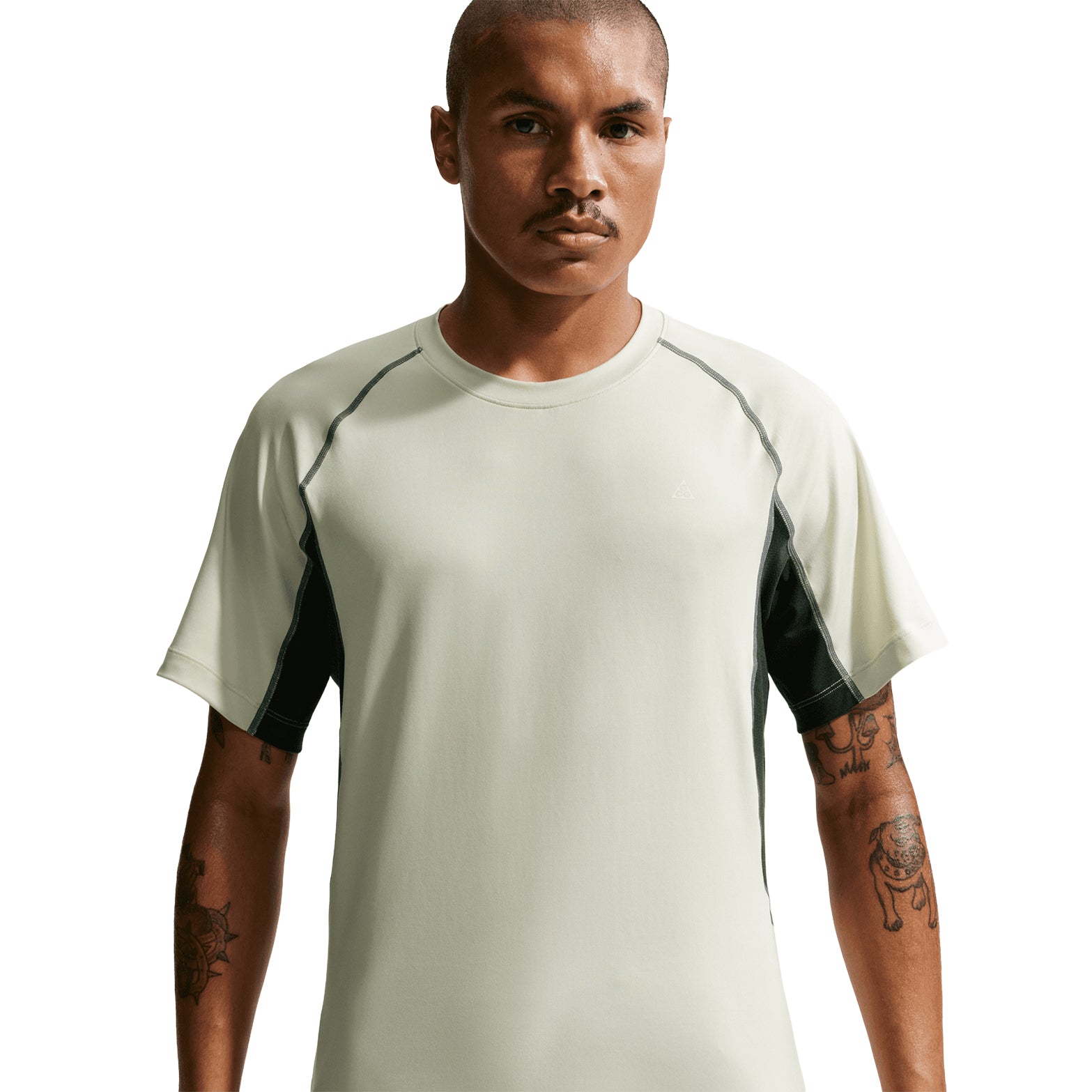 Men's Nike ACG Wildsee Dri-FIT Base-Layer Tee Sea Glass Black Spruce Summit White front view on male model showing snug base layer fit with UV-resistant Dri-FIT fabric for trail running and mountain activities