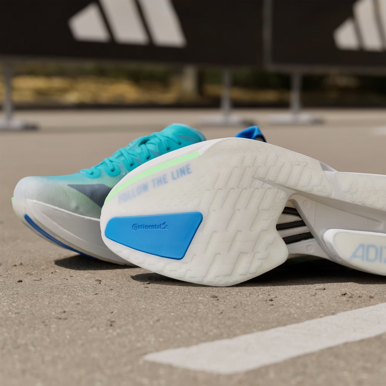 Men's Adizero Adios Pro 4 Running Shoes Hi-Res Aqua Iron Metallic Grey One close-up sole view displaying Continental Rubber outsole