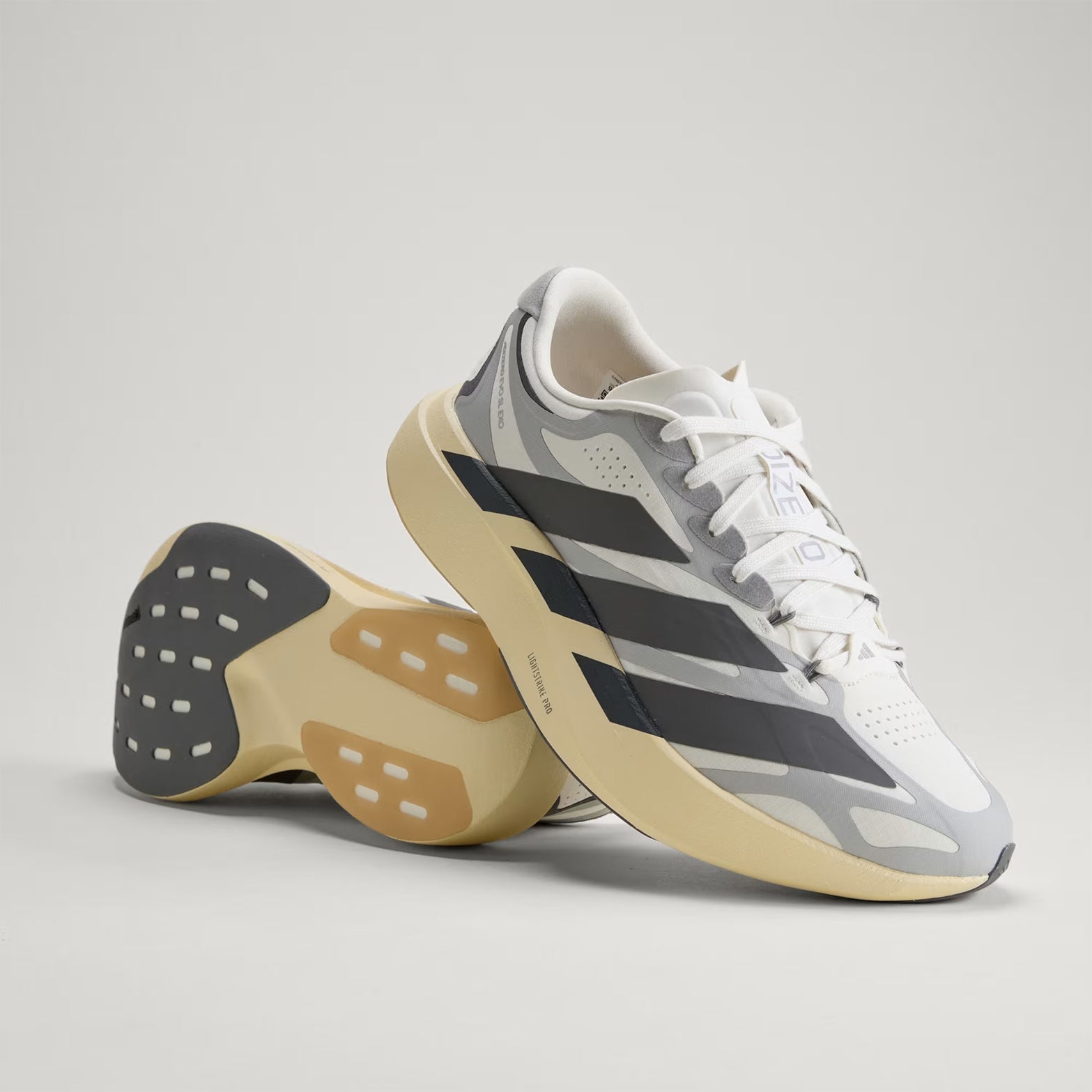 Men's adidas Adizero EVO SL EXO Running Shoes Core White Utility Black Grey Two top view showing EXOSKELETON upper fit system with textile construction and racing-inspired oversized 3-Stripes