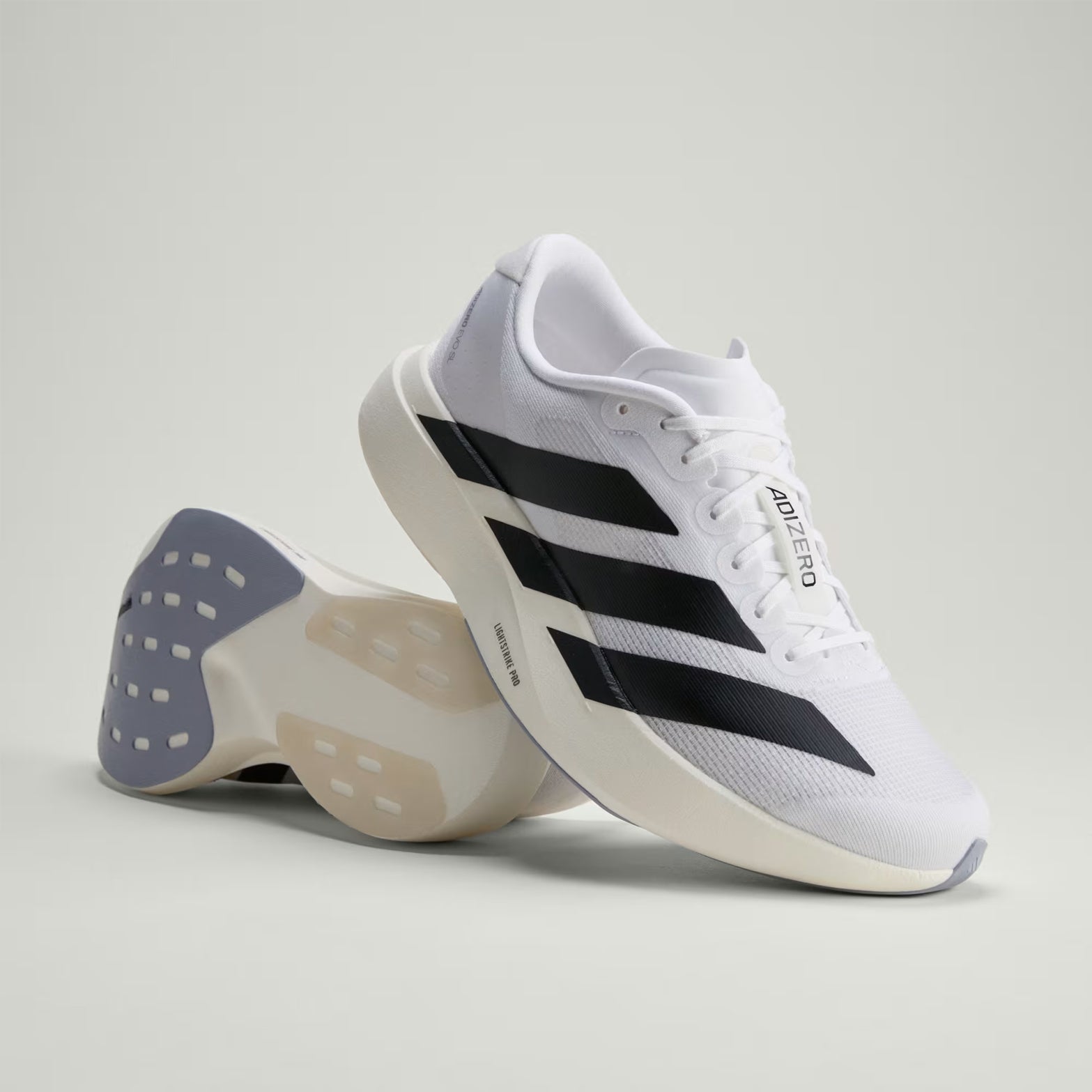 Men's adidas Adizero Evo SL Running Shoes Cloud White Core Black Cloud White sole view displaying Continental rubber forefoot and CL rubber rearfoot patches for traction and durability