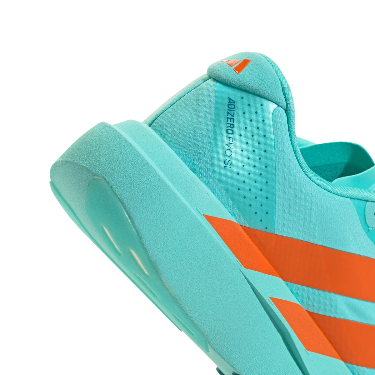 Close-up of a turquoise athletic shoe with bold orange stripes and the text ADIZERO SL on the side, highlighting the heel and midsole design.